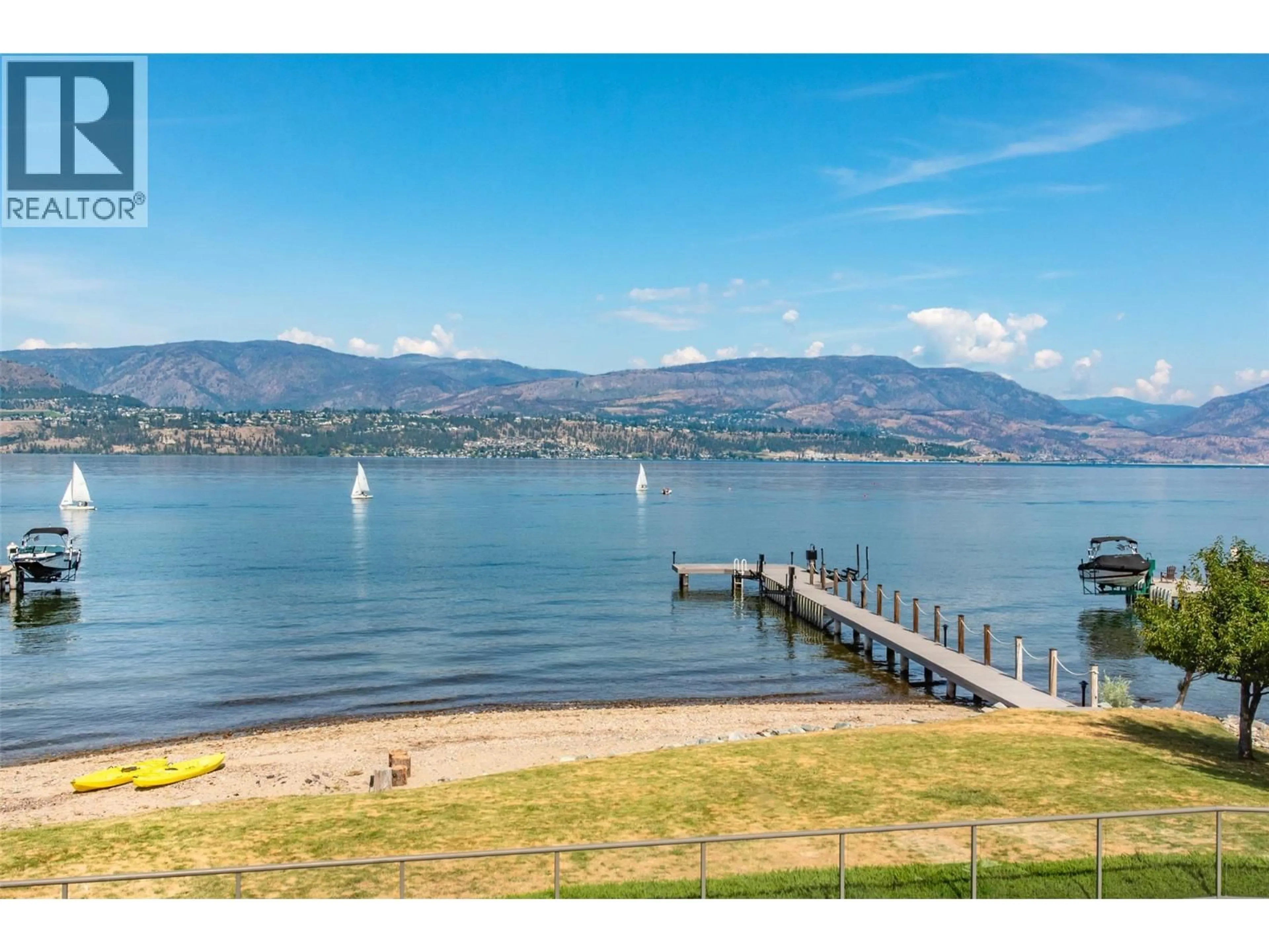 A pic from outside/outdoor area/front of a property/back of a property/a pic from drone, water/lake/river/ocean view for 4260 HOBSON ROAD, Kelowna British Columbia V1W1Y3
