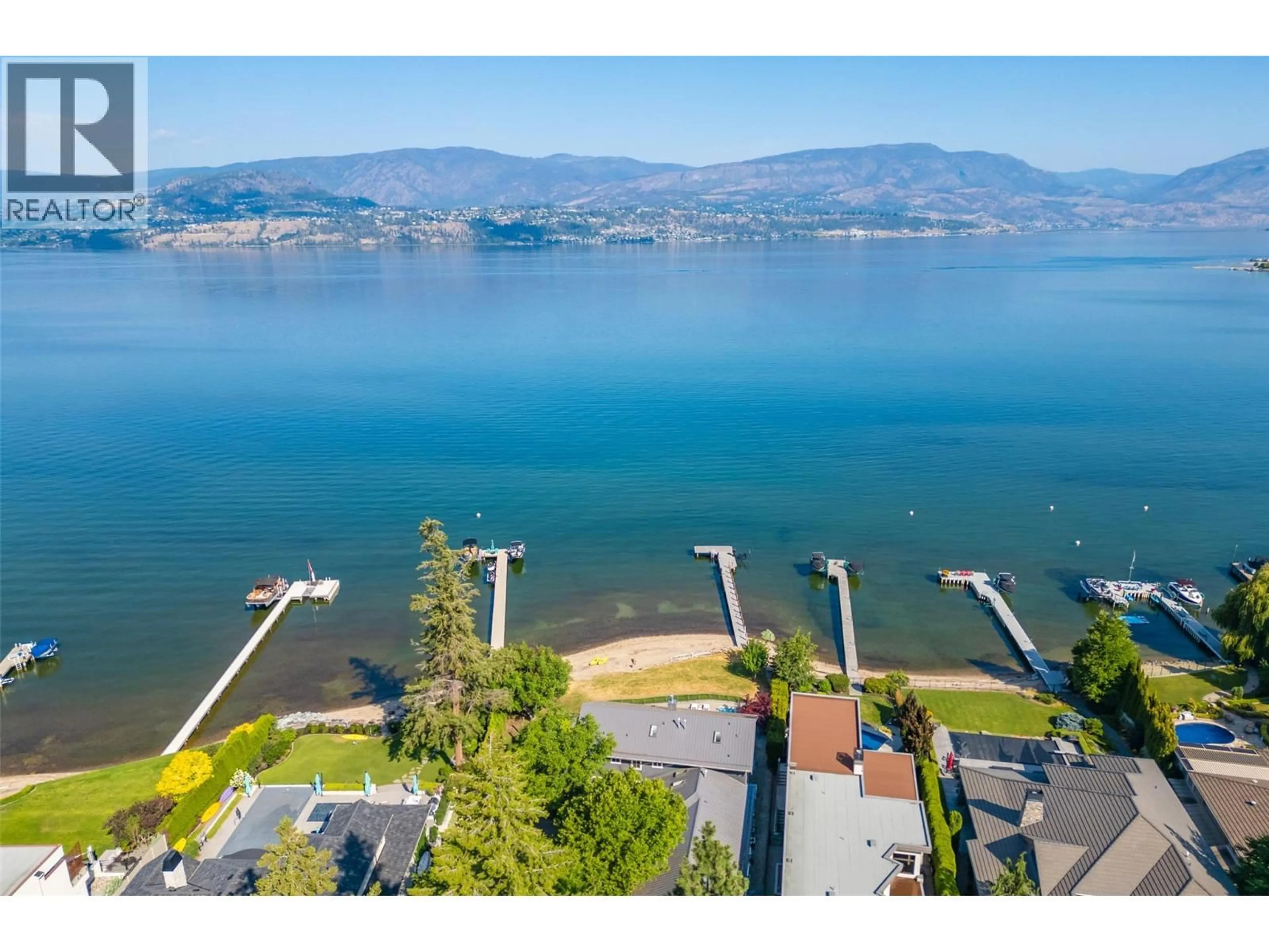 A pic from outside/outdoor area/front of a property/back of a property/a pic from drone, water/lake/river/ocean view for 4260 HOBSON ROAD, Kelowna British Columbia V1W1Y3