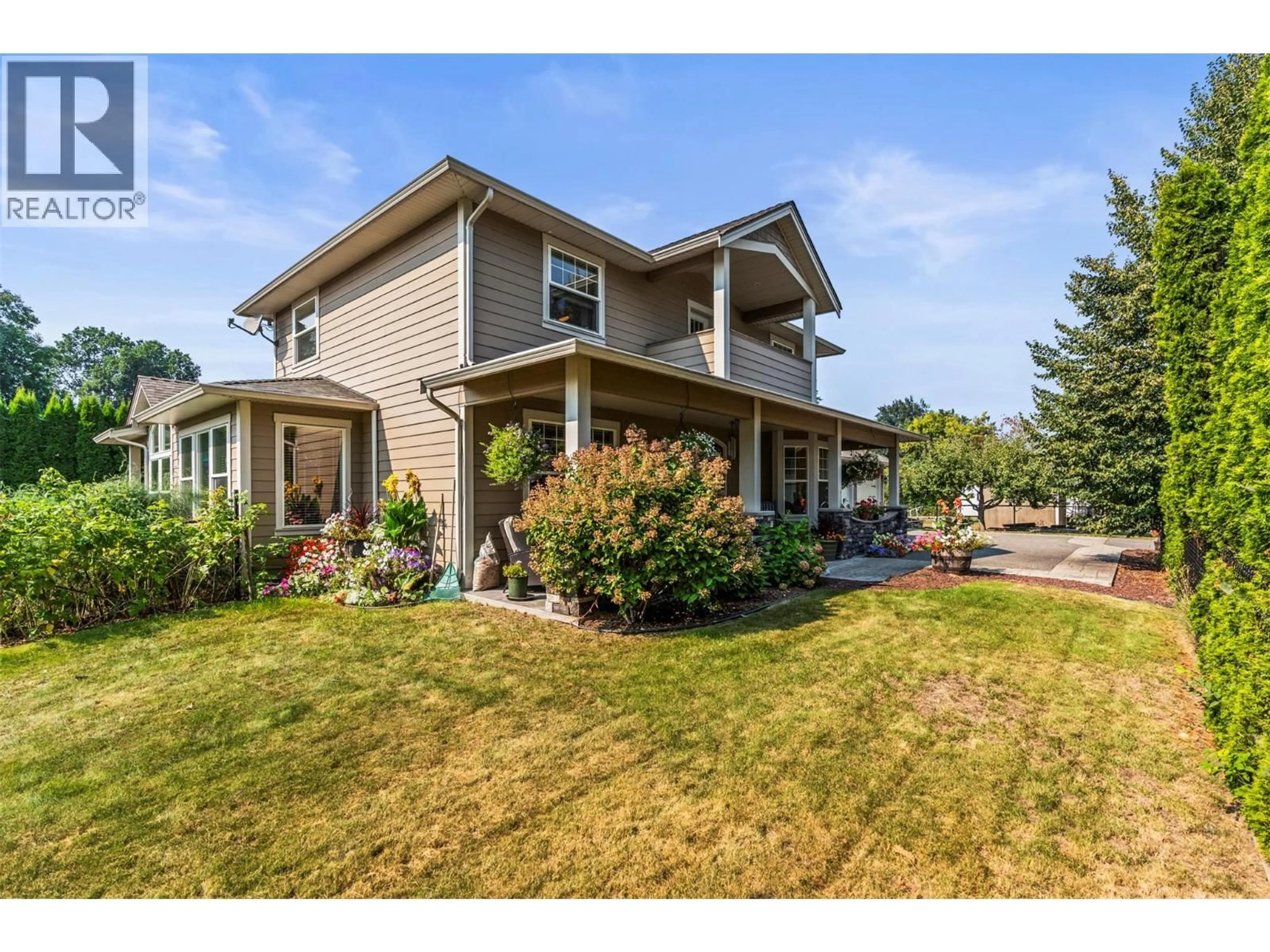 Home with vinyl exterior material, street for 2955 OKANAGAN STREET, Armstrong British Columbia V4Y0A8
