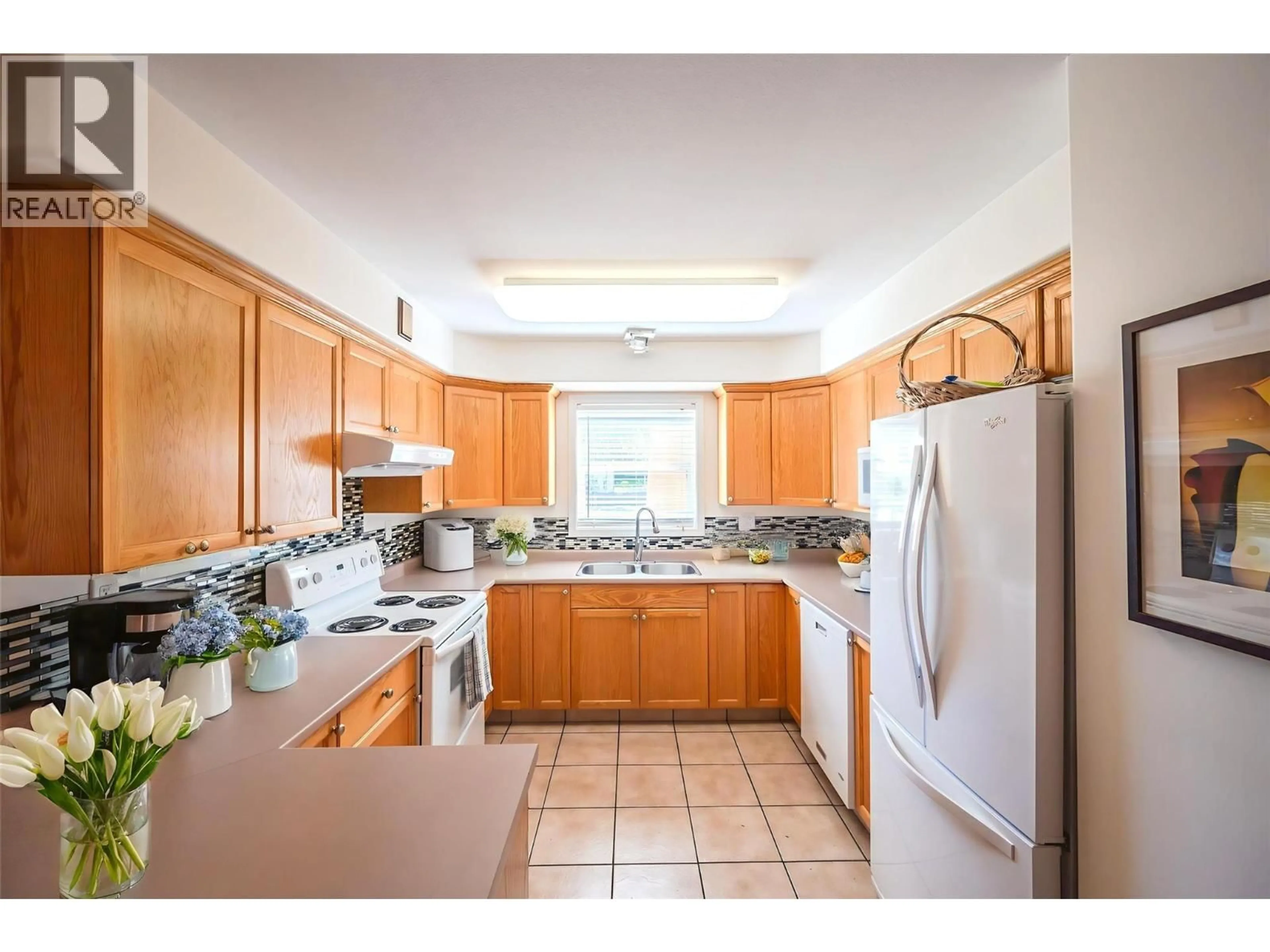 Standard kitchen, ceramic/tile floor for 116 - 9307 62ND AVENUE, Osoyoos British Columbia V0H1V1
