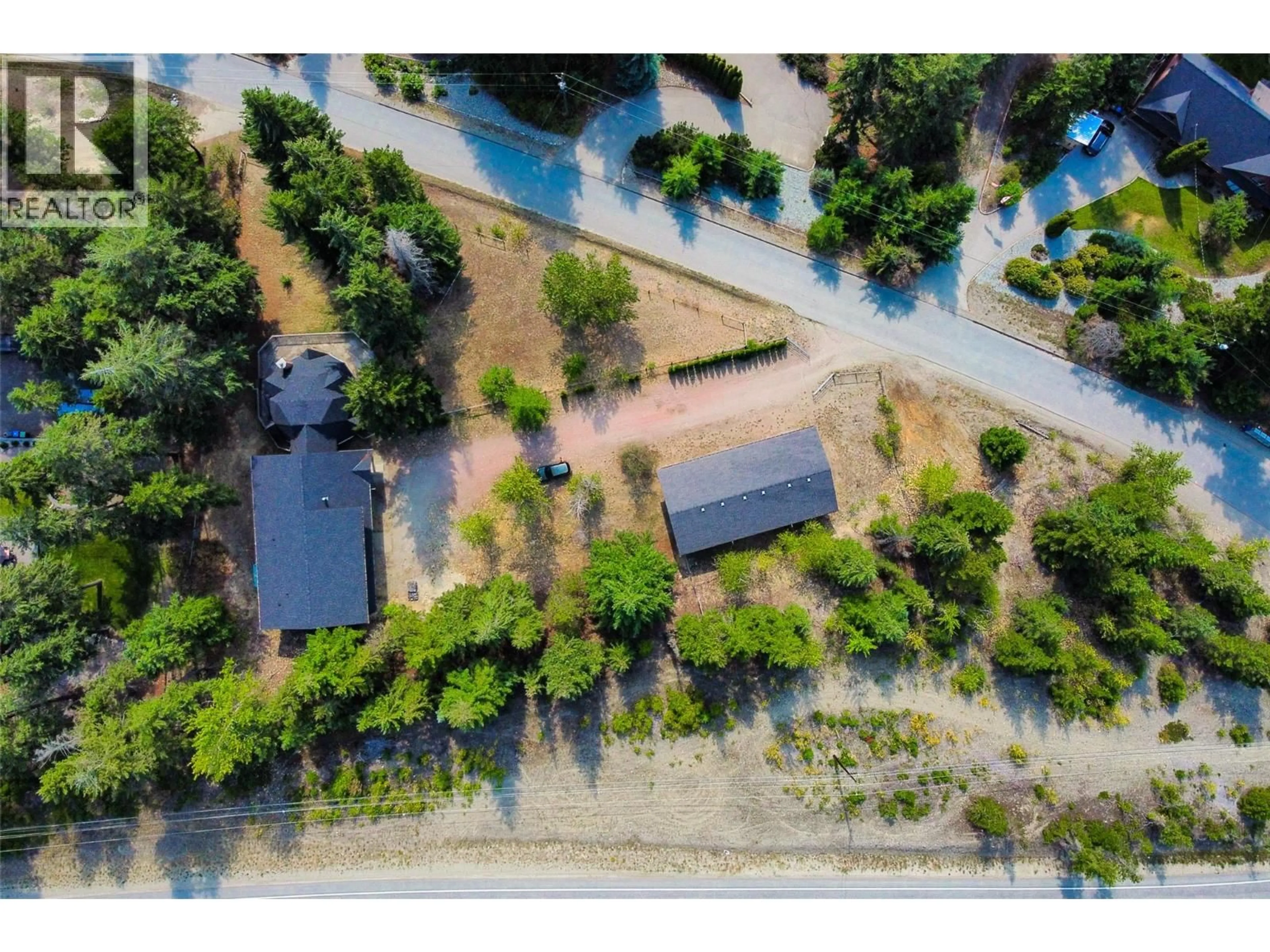 A pic from outside/outdoor area/front of a property/back of a property/a pic from drone, street for 7604 FALCON RIDGE CRESCENT, Kelowna British Columbia V1P1J1