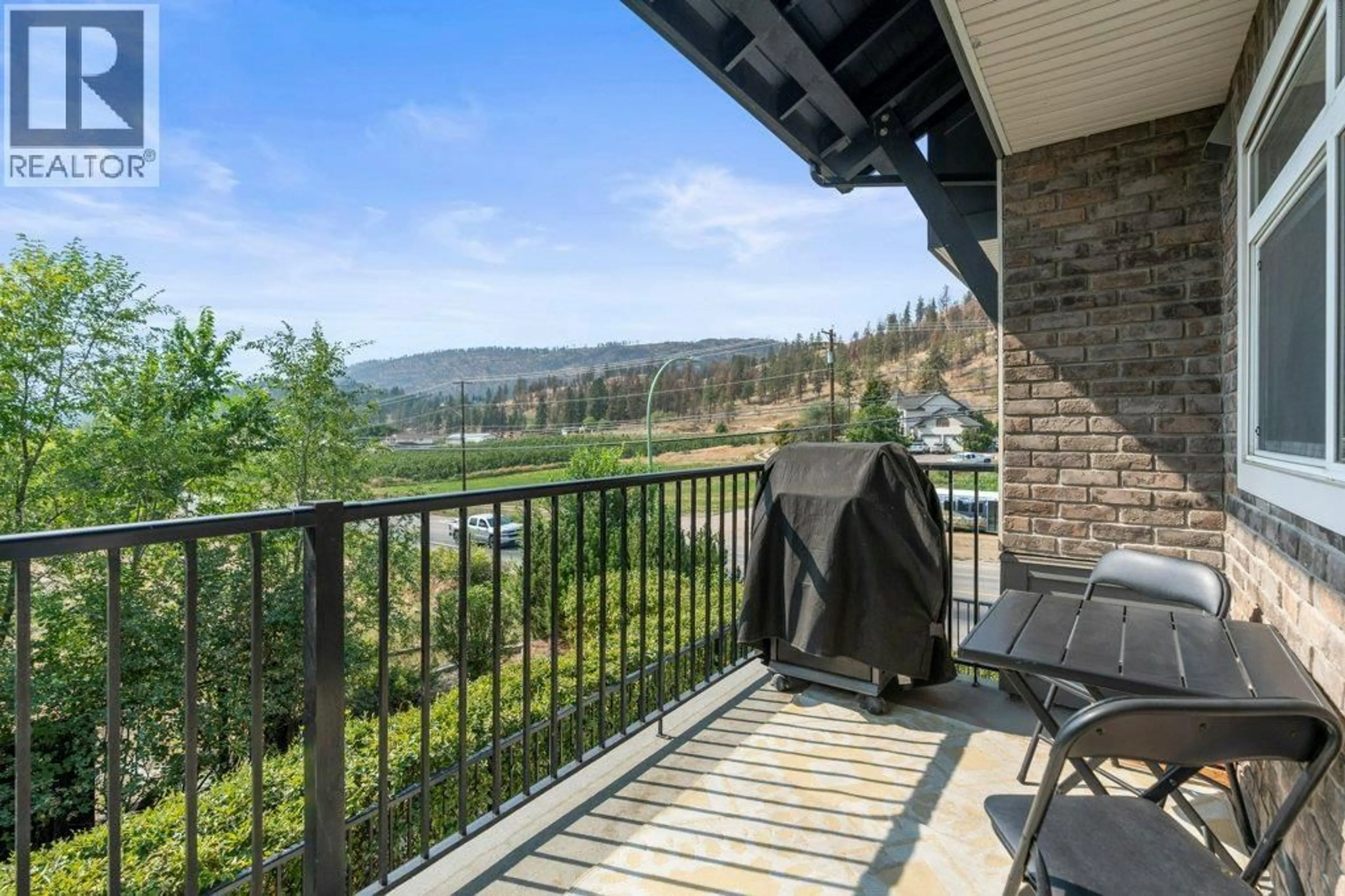 Patio, water/lake/river/ocean view for 101B - 1477 GLENMORE ROAD NORTH, Kelowna British Columbia V1V2C5