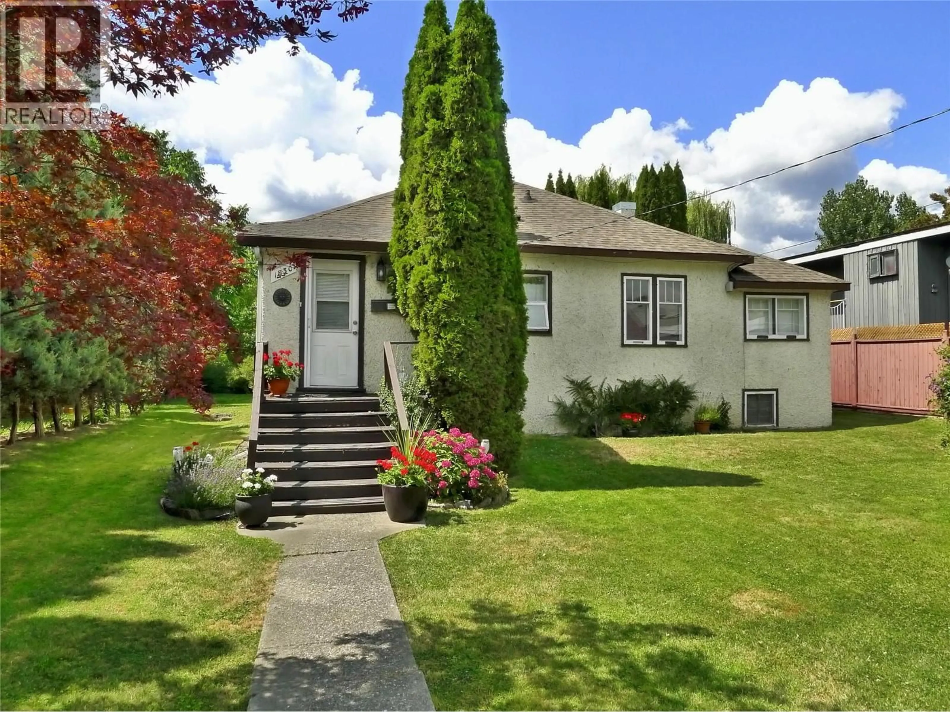 Home with vinyl exterior material, street for 1830 RIVERSIDE AVENUE, Kelowna British Columbia V1Y1A7
