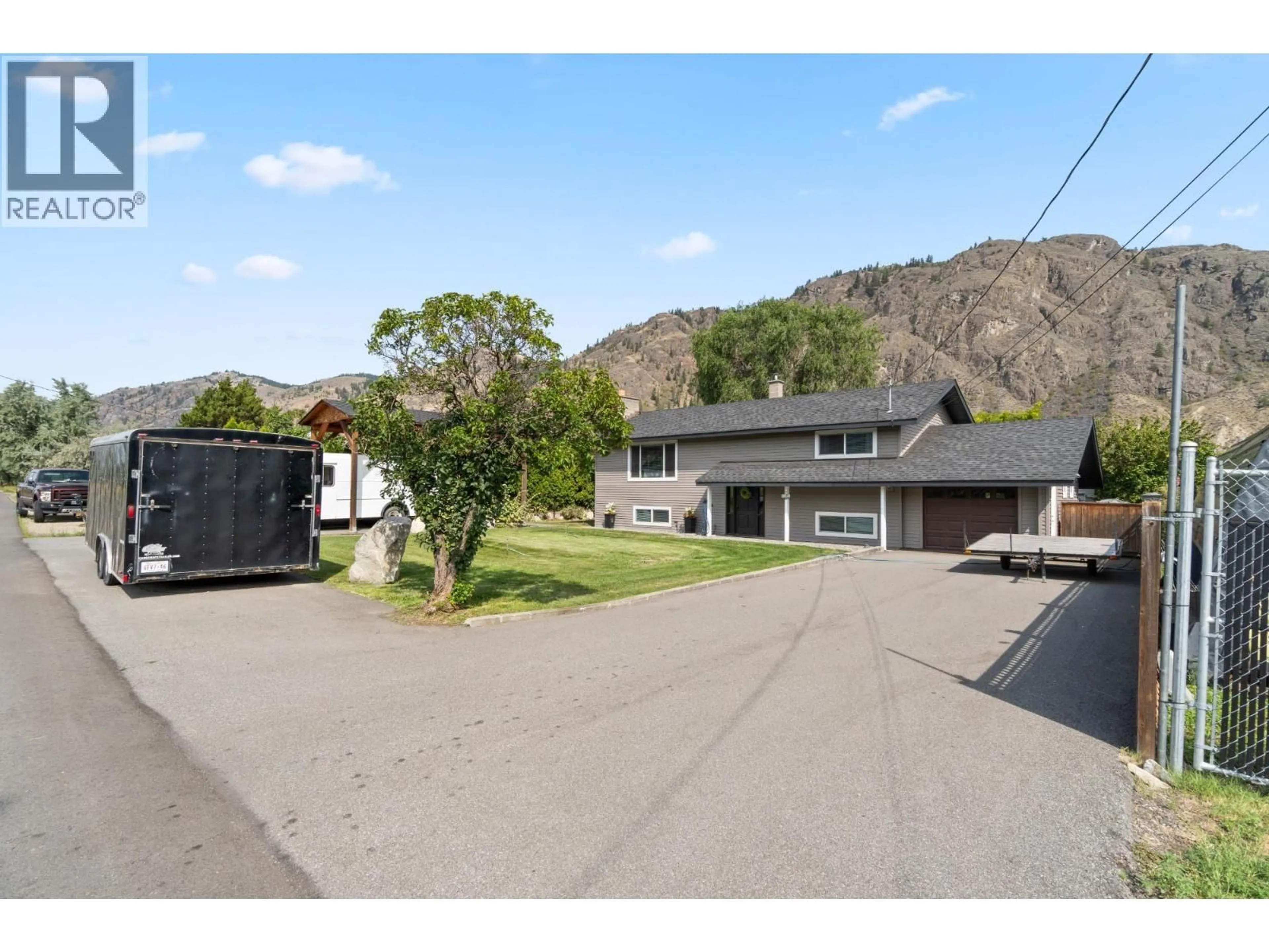 A pic from outside/outdoor area/front of a property/back of a property/a pic from drone, mountain view for 1747 OLD FERRY ROAD, Kamloops British Columbia V0E2M0