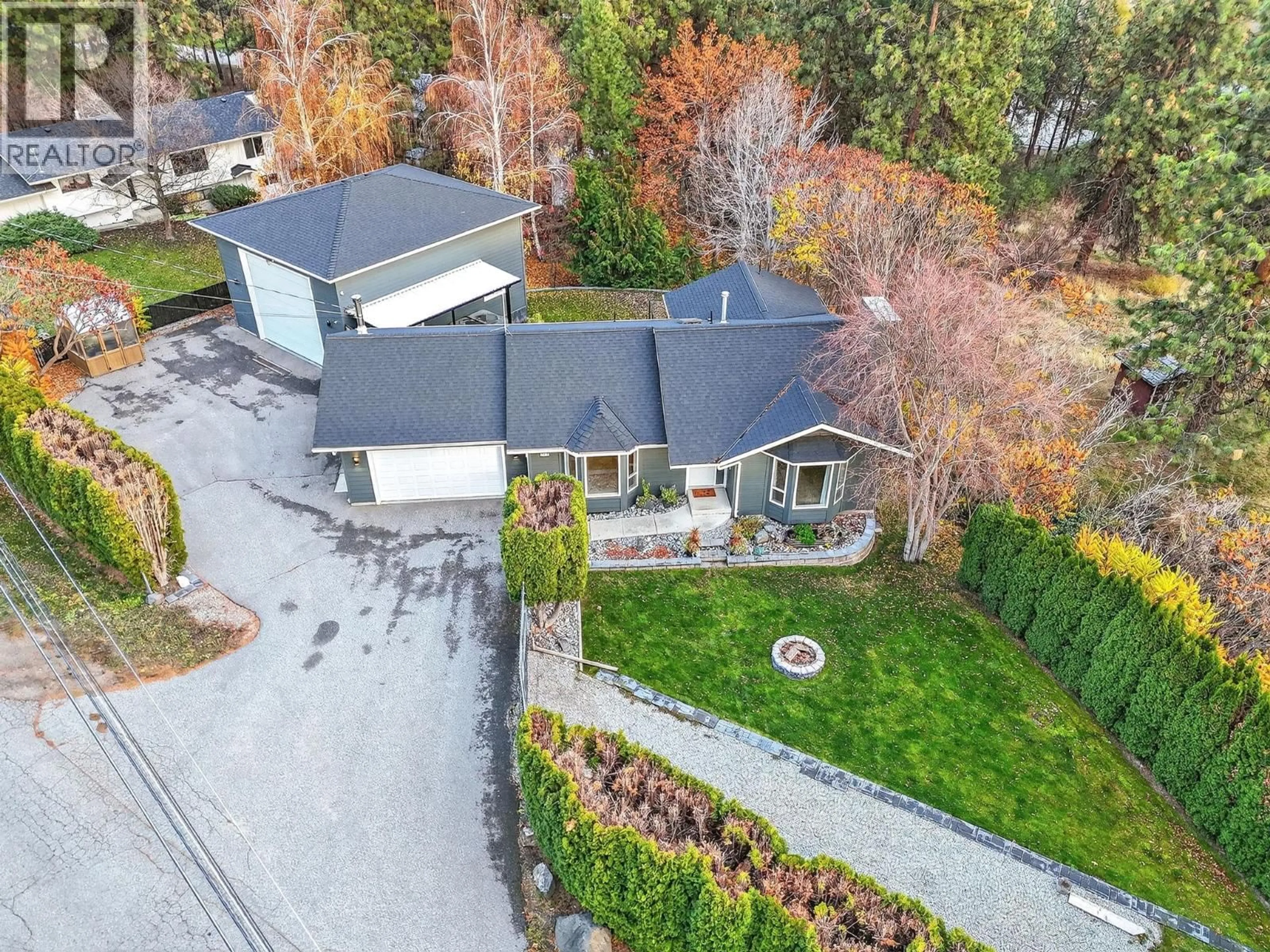 A pic from outside/outdoor area/front of a property/back of a property/a pic from drone, street for 3319 GROUSE ROAD, West Kelowna British Columbia V4T2H2