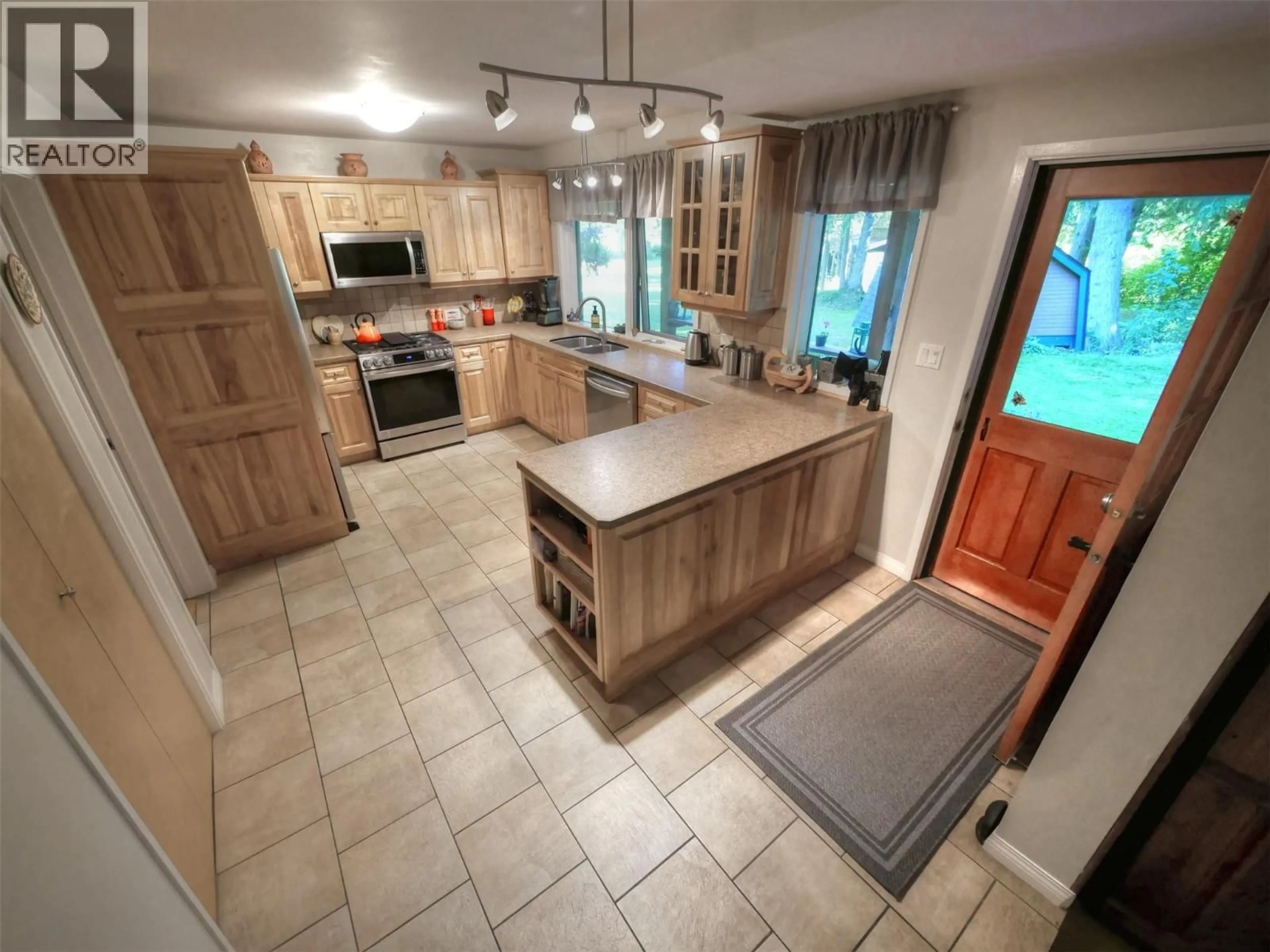 Open concept kitchen, ceramic/tile floor for 2827 EVIN ROAD, Slocan Park British Columbia V0G2E0