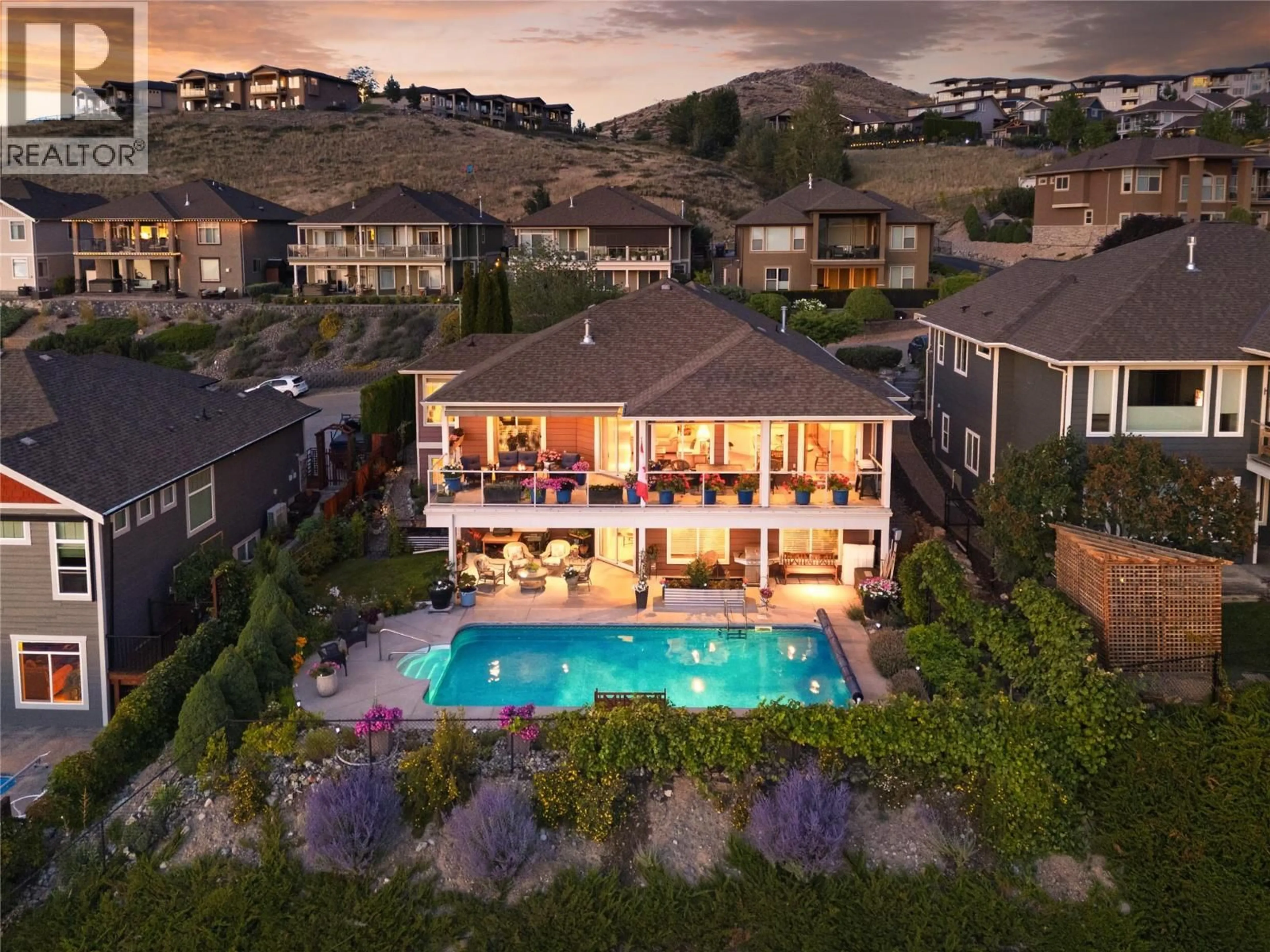A pic from outside/outdoor area/front of a property/back of a property/a pic from drone, mountain view for 860 KUIPERS CRESCENT, Kelowna British Columbia V1W5B1