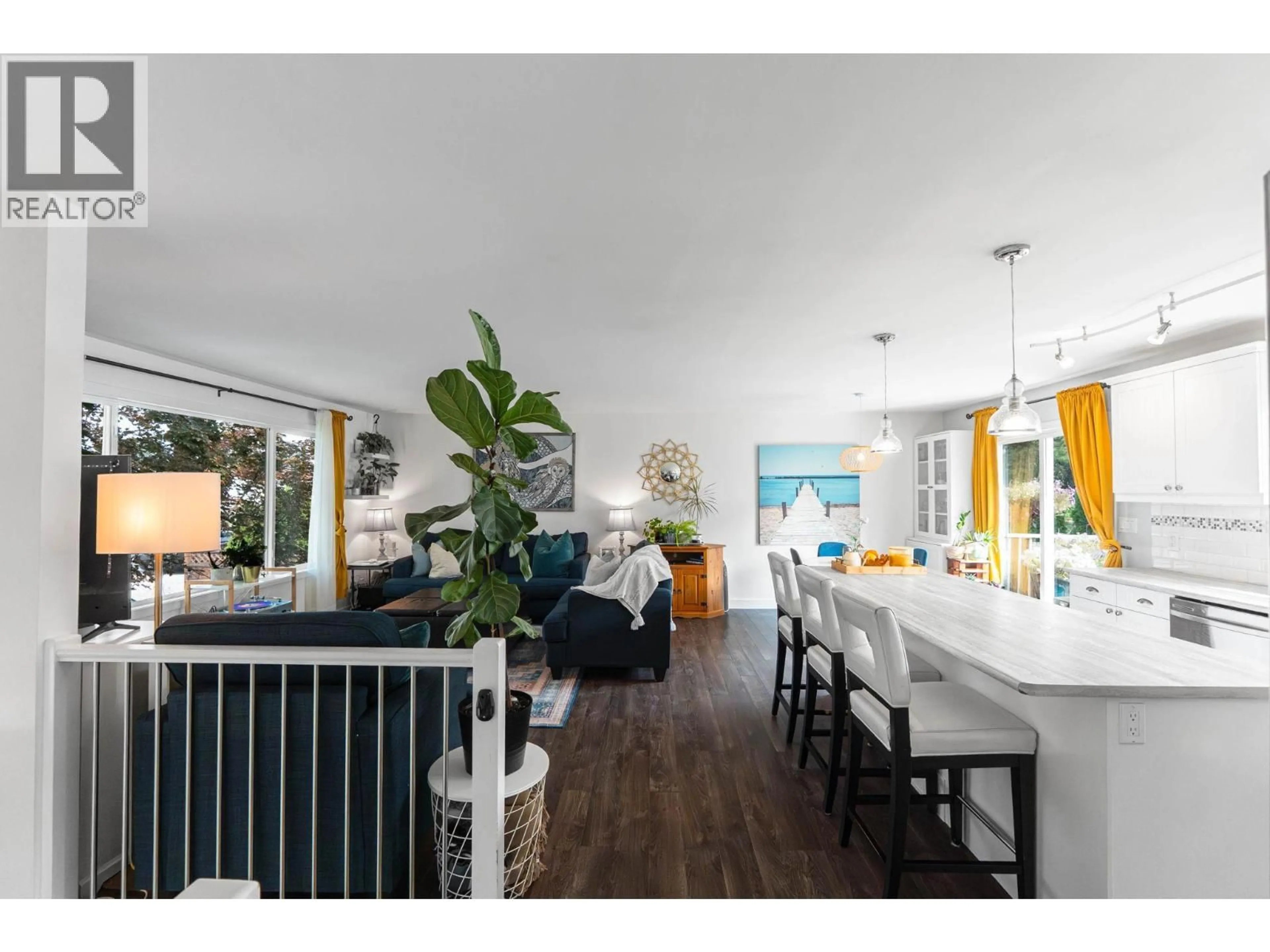 Open concept kitchen, wood/laminate floor for 605 STIRLING ROAD, Kelowna British Columbia V1X3X4