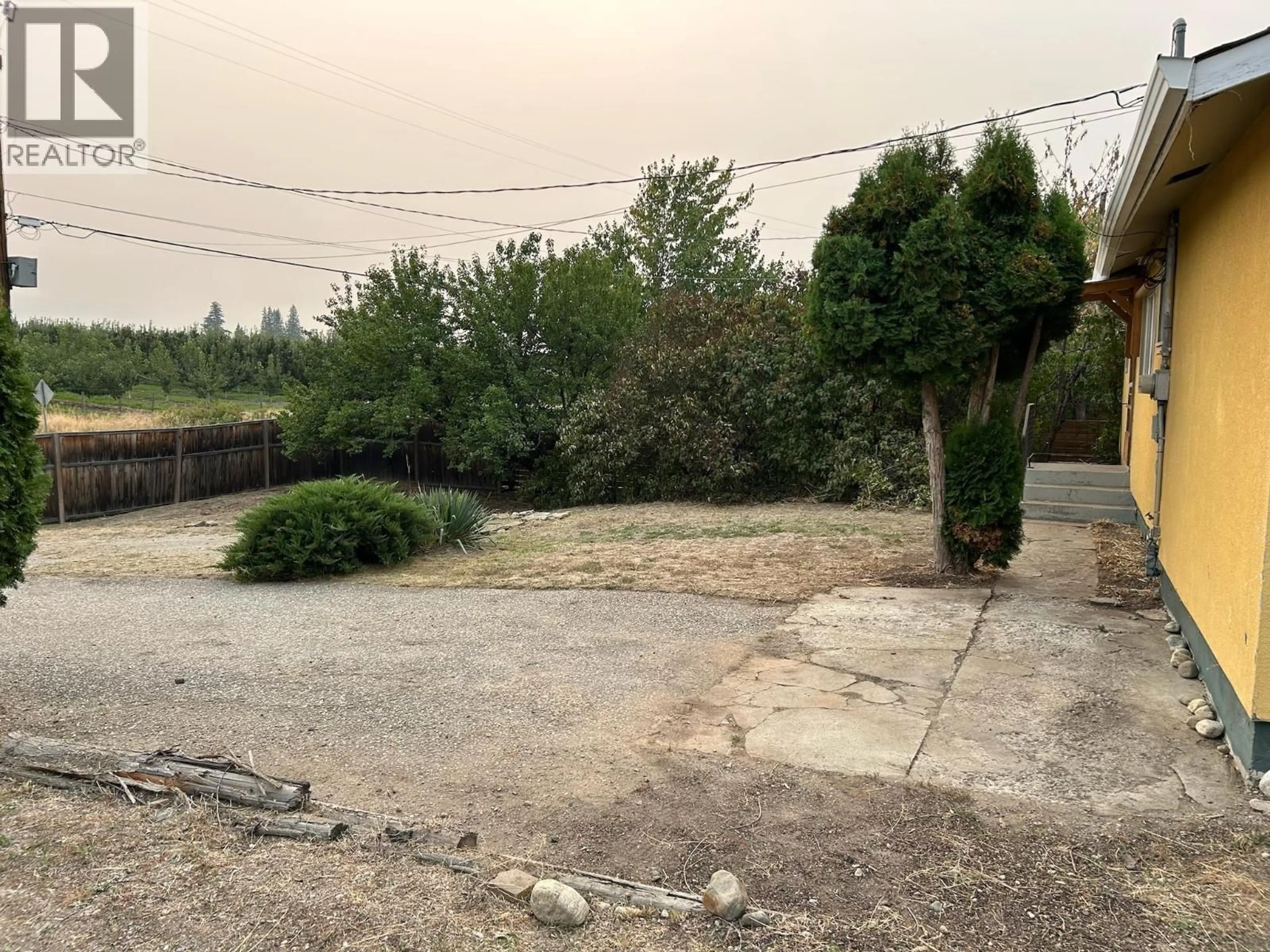 A pic from outside/outdoor area/front of a property/back of a property/a pic from drone, street for 3236 MCCULLOCH ROAD, Kelowna British Columbia V1W4G5