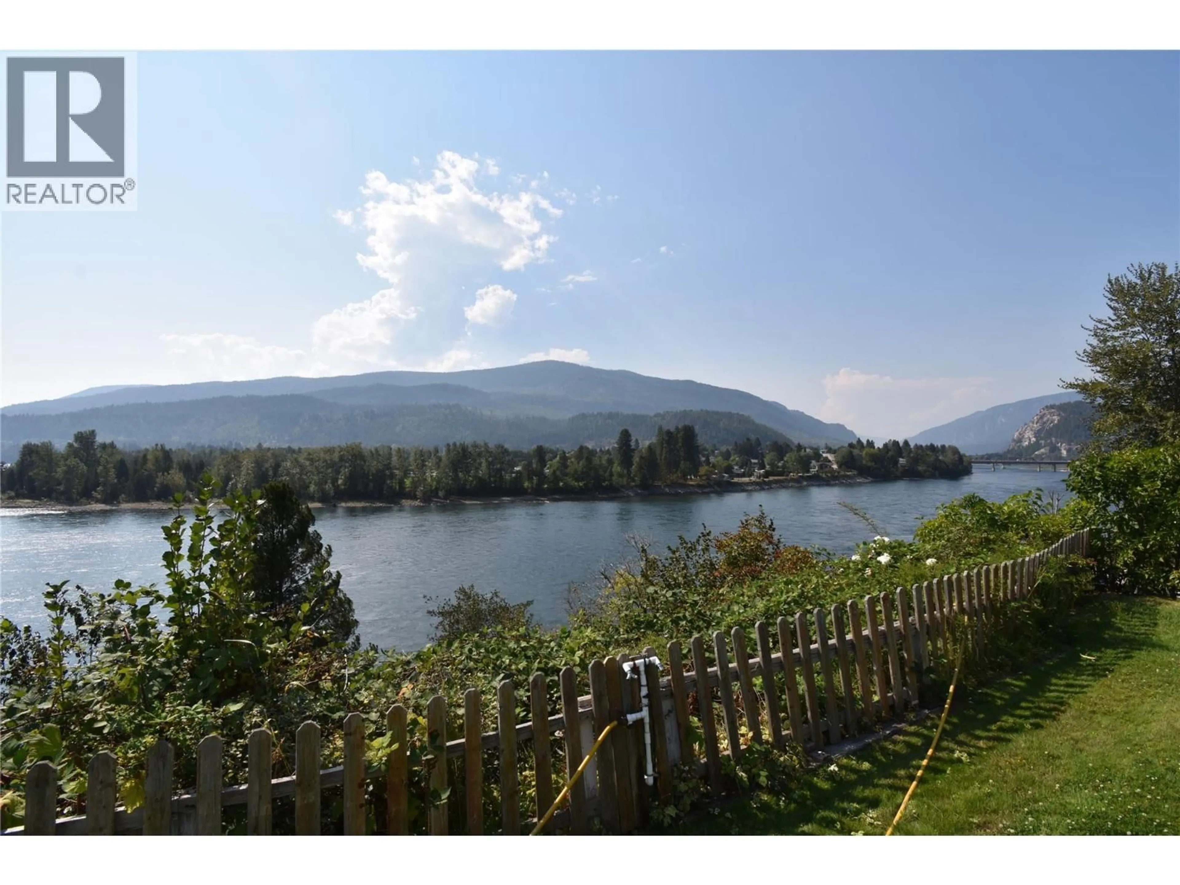 A pic from outside/outdoor area/front of a property/back of a property/a pic from drone, water/lake/river/ocean view for 1960 BRILLIANT ROAD, Castlegar British Columbia V1N4M2