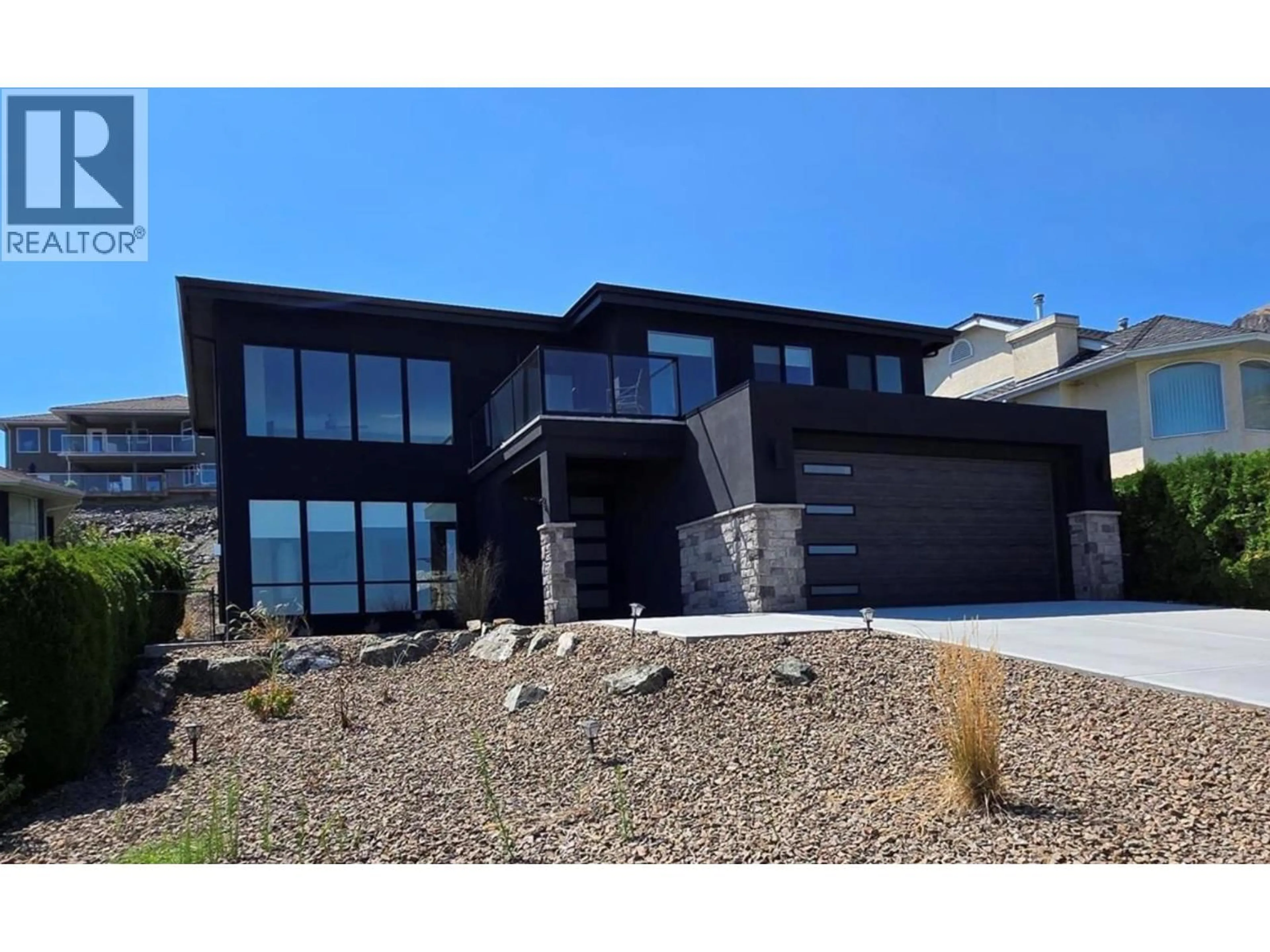 Home with brick exterior material, unknown for 11706 QUAIL RIDGE PLACE, Osoyoos British Columbia V0H1V4