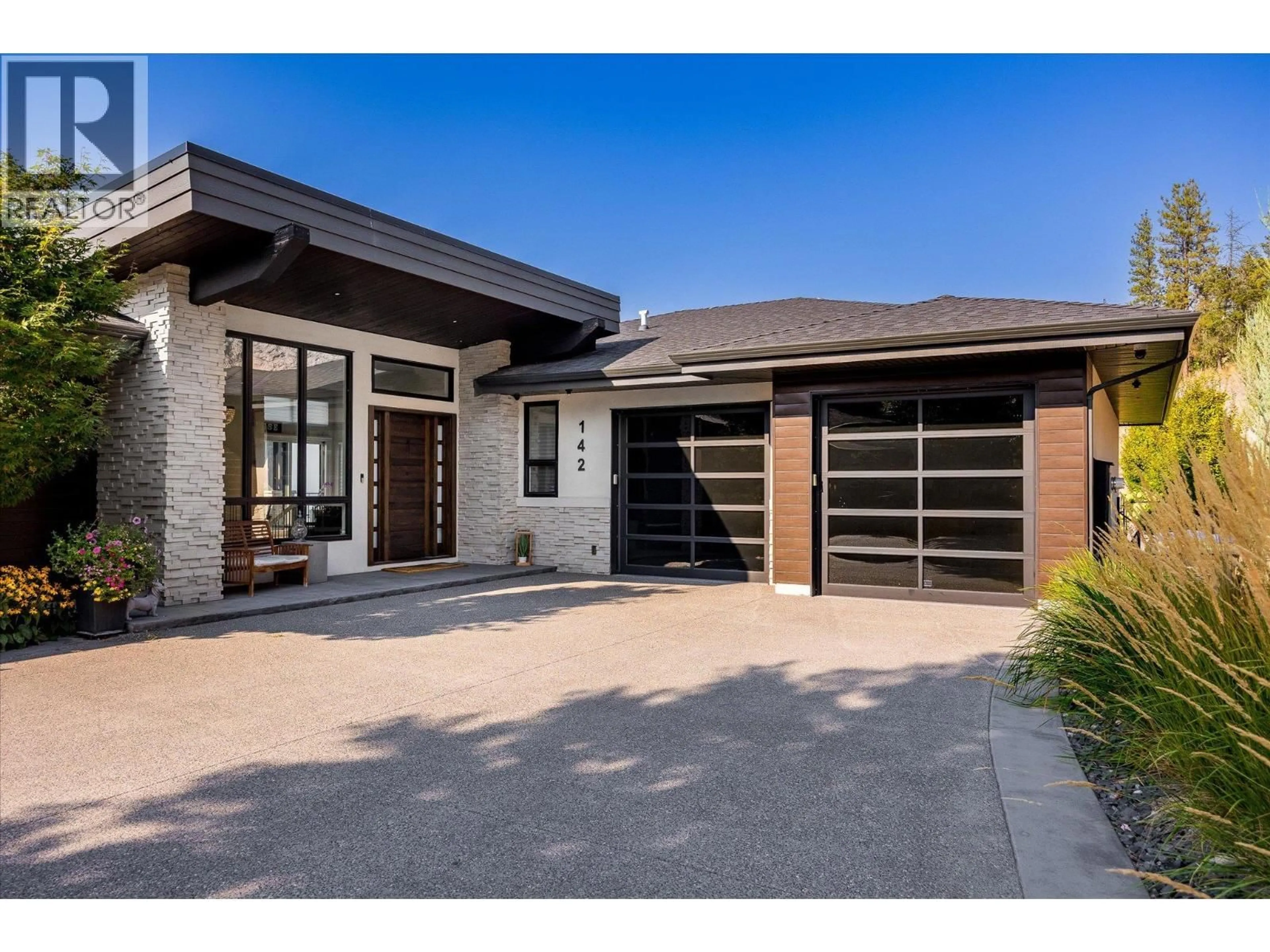 Home with brick exterior material, street for 142 RED SKY COURT, Kelowna British Columbia V1V3G4