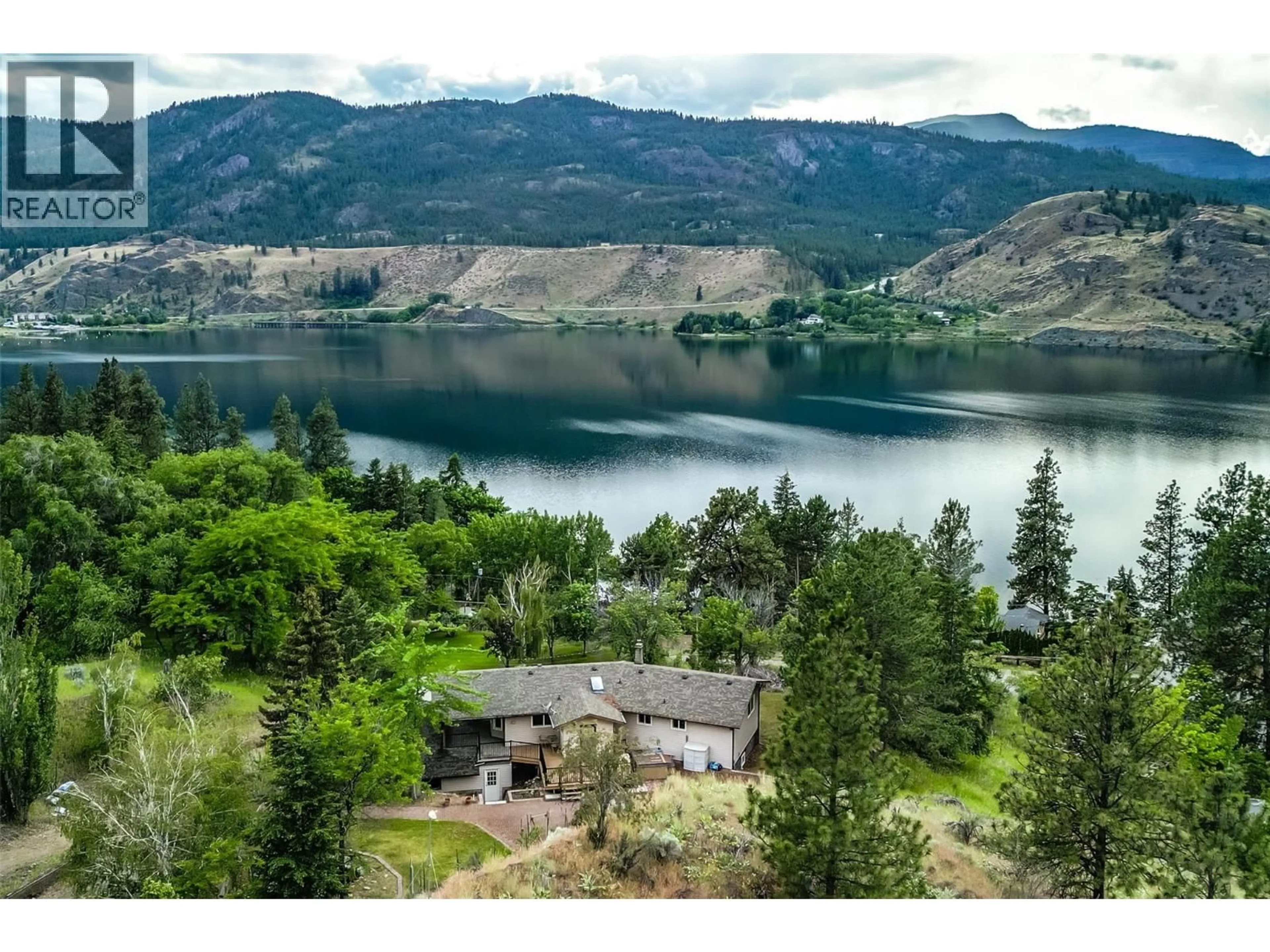 A pic from outside/outdoor area/front of a property/back of a property/a pic from drone, water/lake/river/ocean view for 331 EASTSIDE ROAD, Okanagan Falls British Columbia V0H1R5