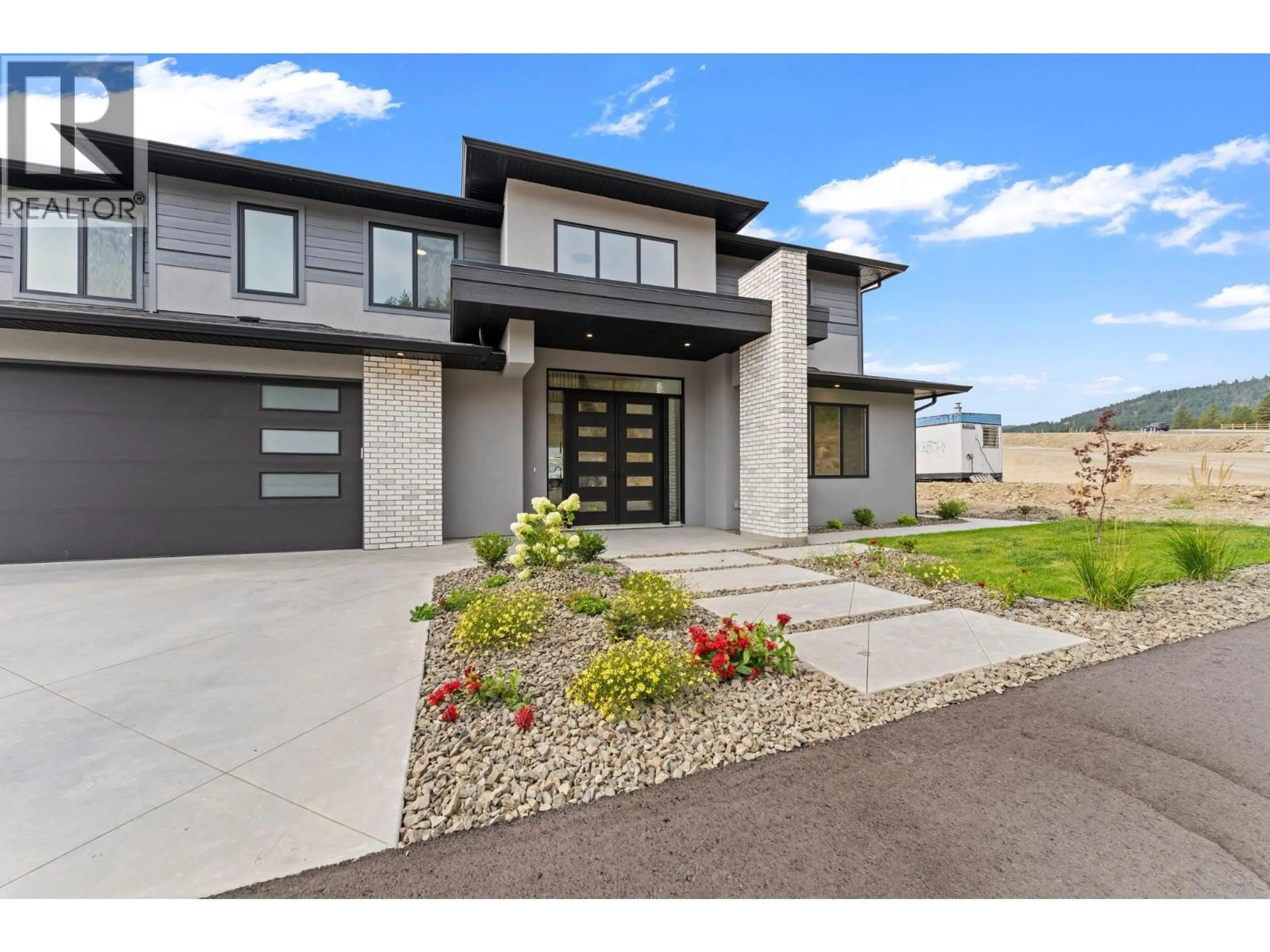 Home with brick exterior material, street for 2871 COPPER RIDGE DRIVE, West Kelowna British Columbia V4T0E7