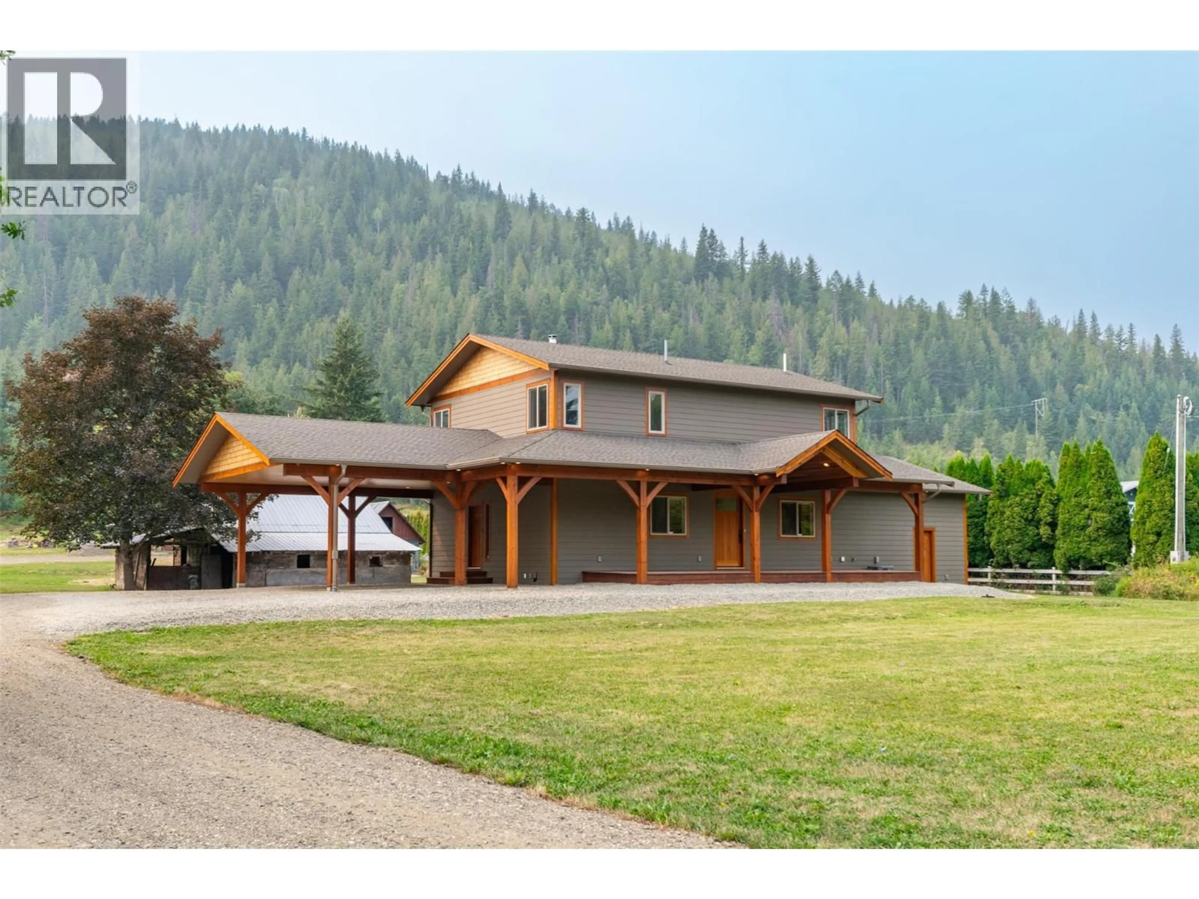 Home with vinyl exterior material, mountain view for 1690 20 AVENUE SOUTHEAST, Salmon Arm British Columbia V1E2M9