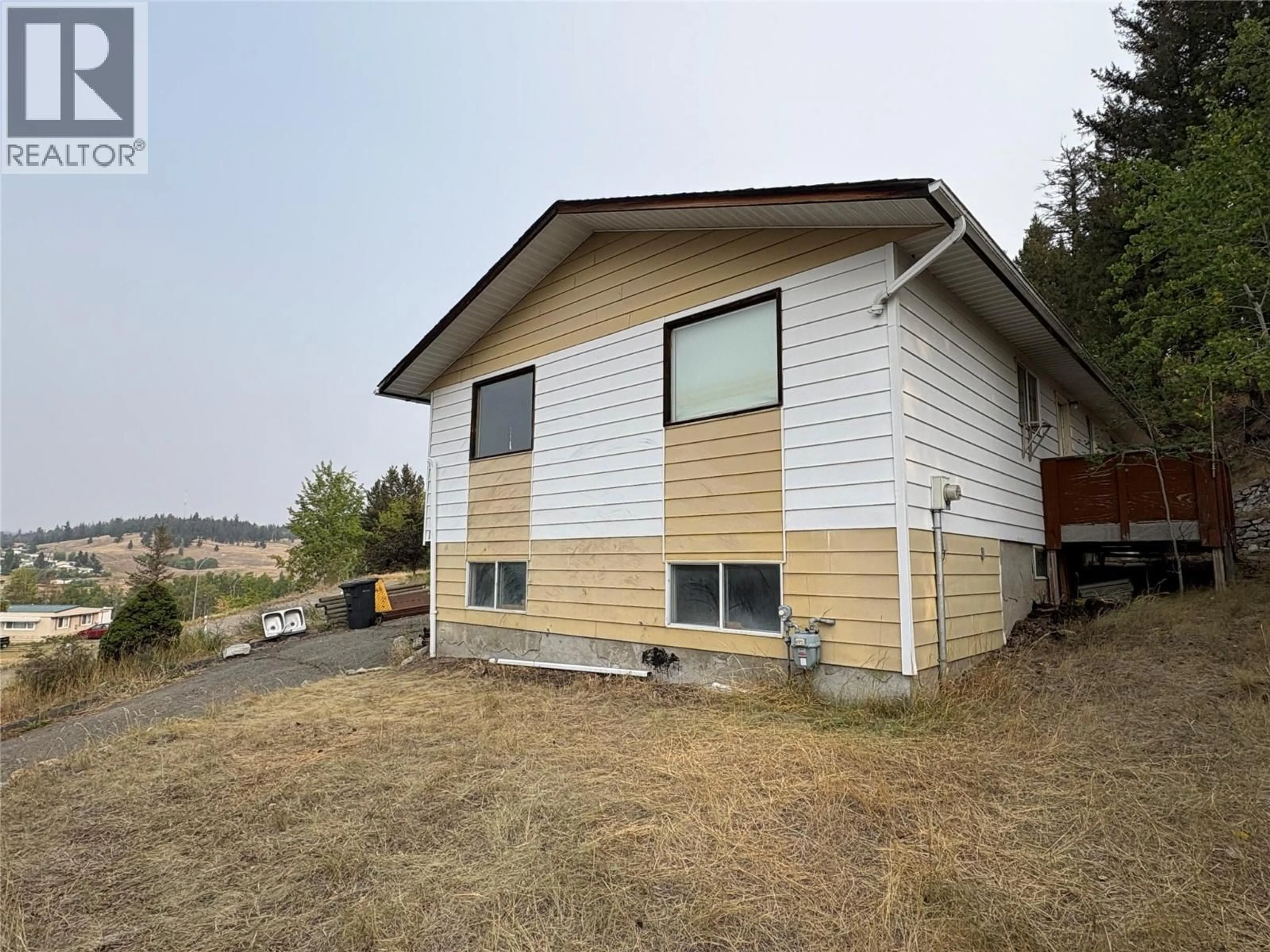 Home with vinyl exterior material, building for 11 JASPER DRIVE, Logan Lake British Columbia V0K1W0