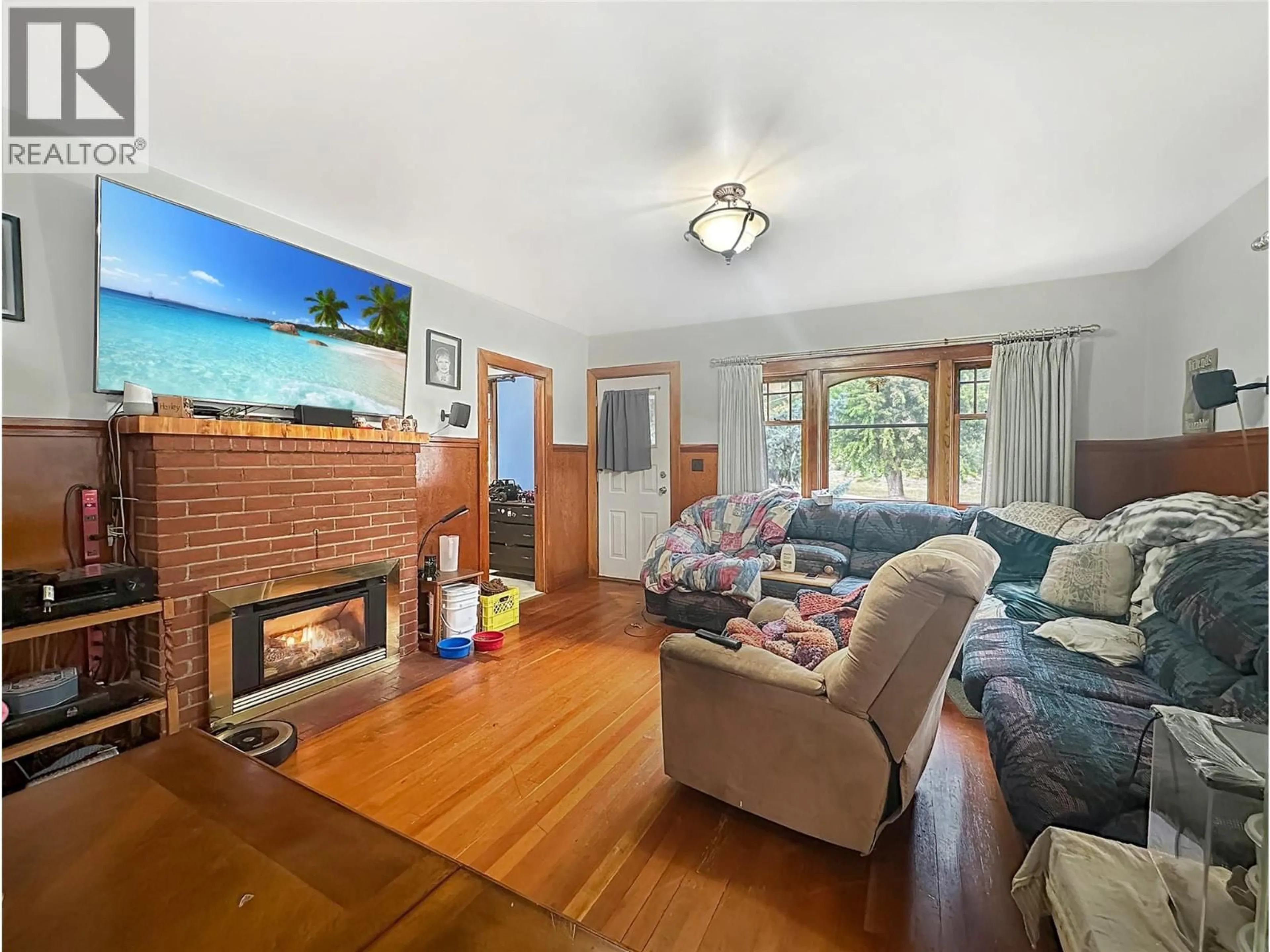 Living room with furniture, wood/laminate floor for 60 ANGELA AVENUE, Princeton British Columbia V0X1W0