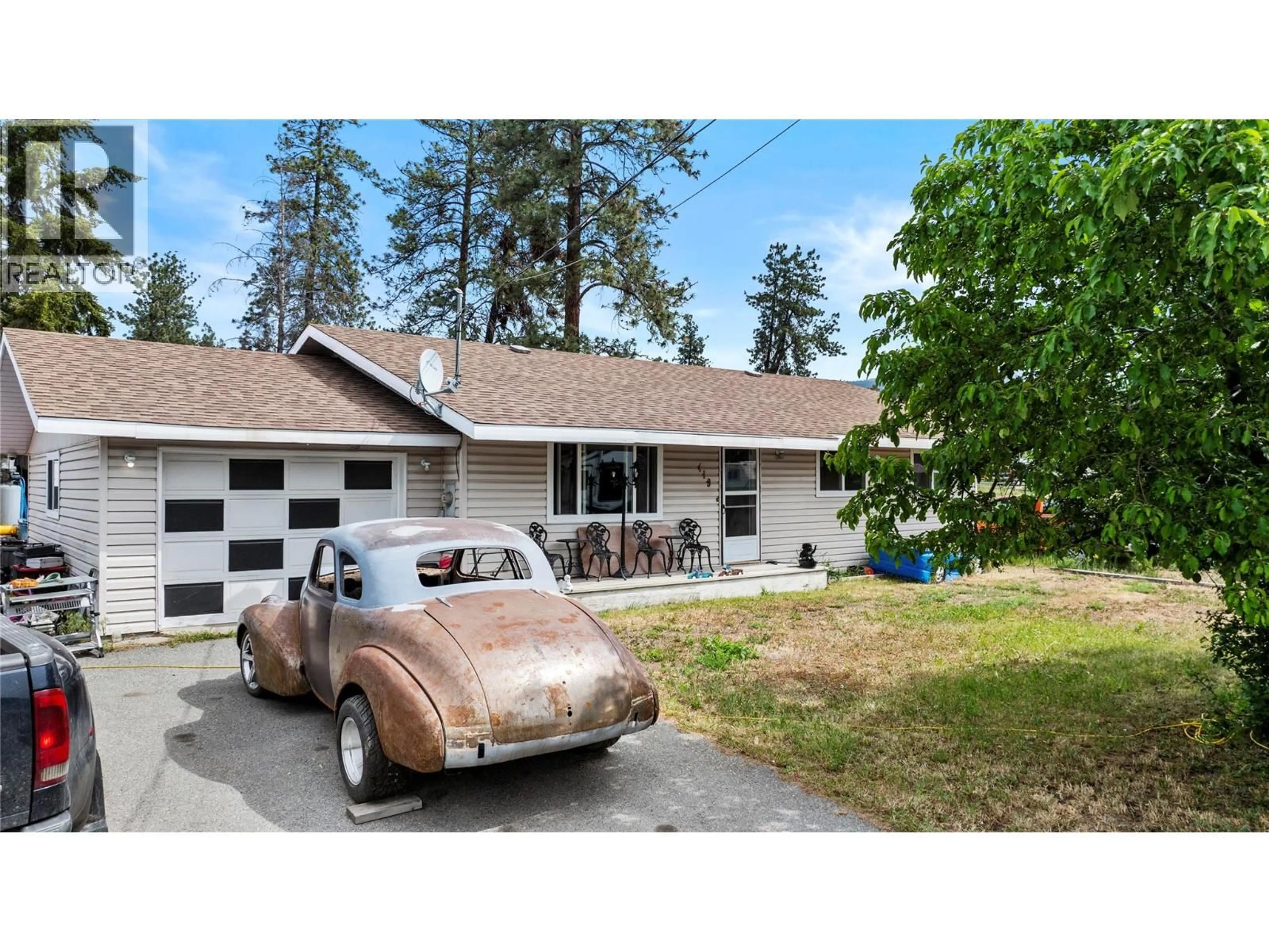 Home with vinyl exterior material, street for 419 DODDING AVENUE, Merritt British Columbia V0K1Y0