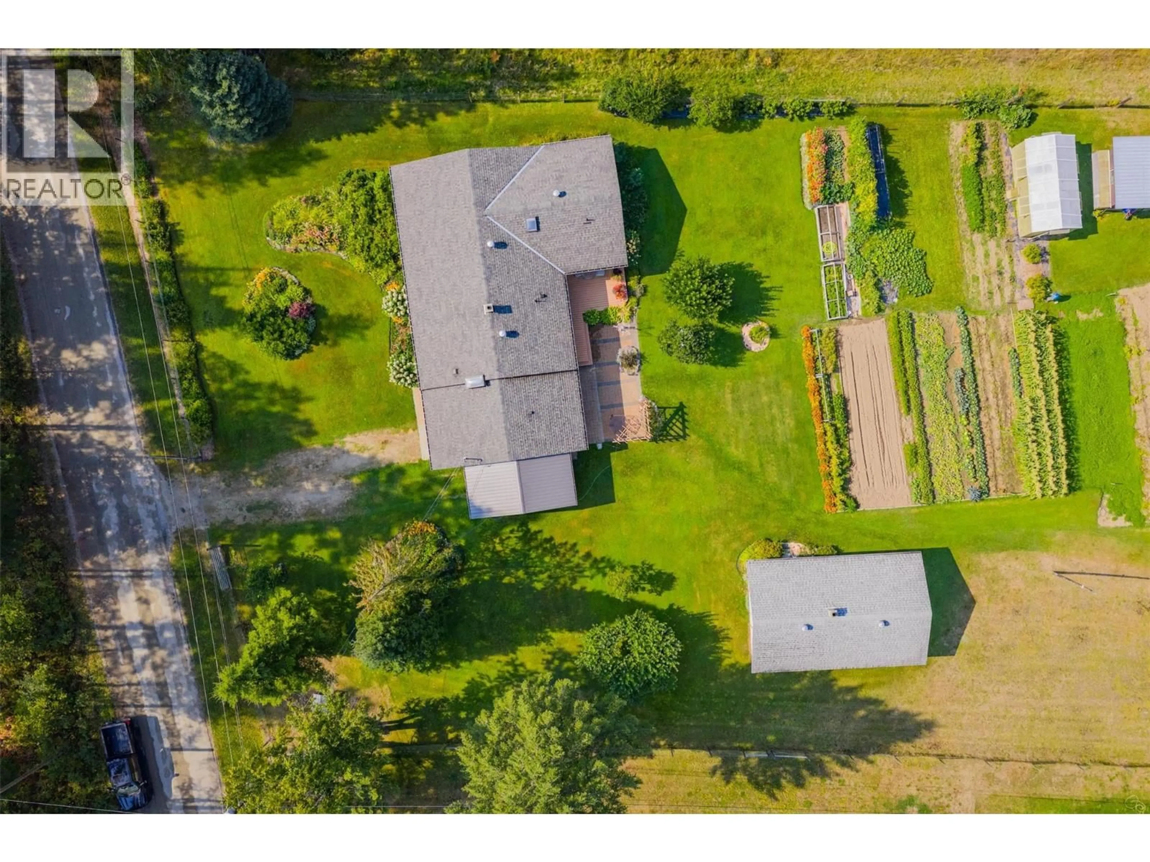 A pic from outside/outdoor area/front of a property/back of a property/a pic from drone, building for 3712 THORPE ROAD, Krestova British Columbia V0G1H2
