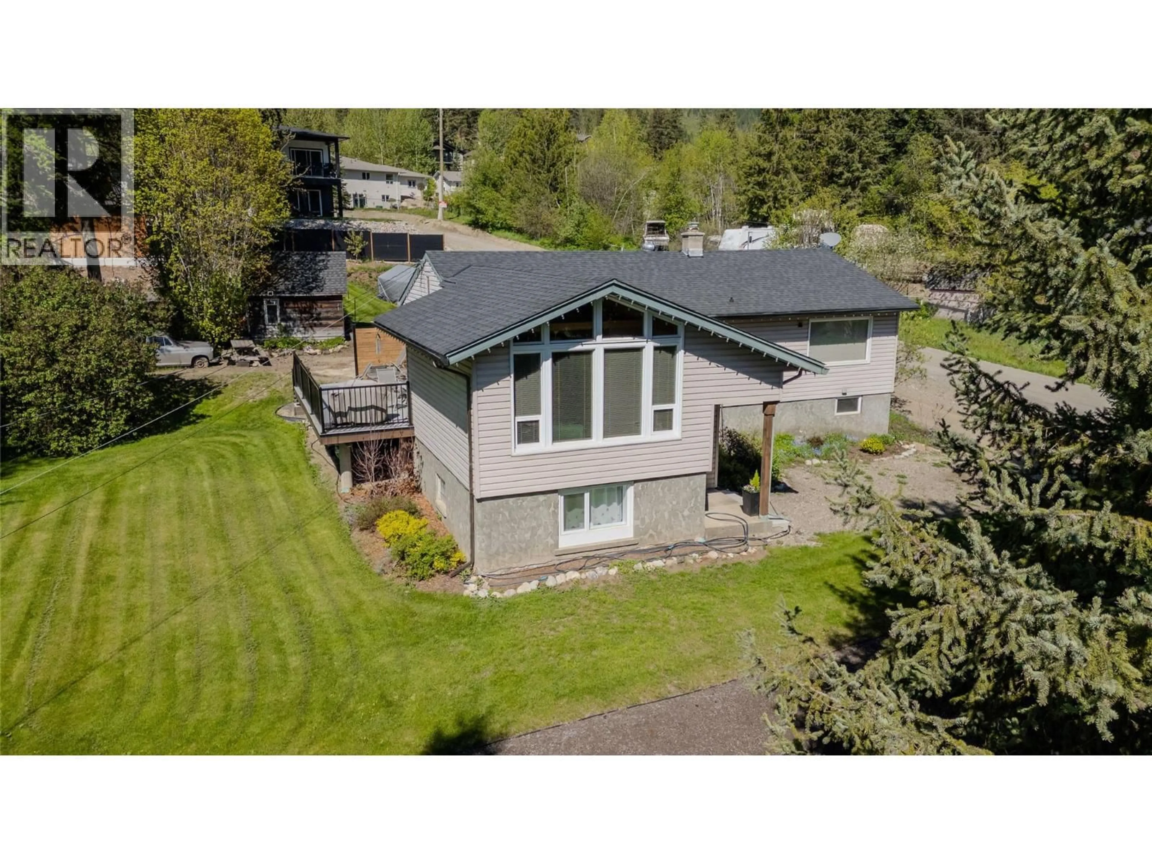 A pic from outside/outdoor area/front of a property/back of a property/a pic from drone, water/lake/river/ocean view for 2506 SHUSWAP AVENUE, Lumby British Columbia V0E2G0