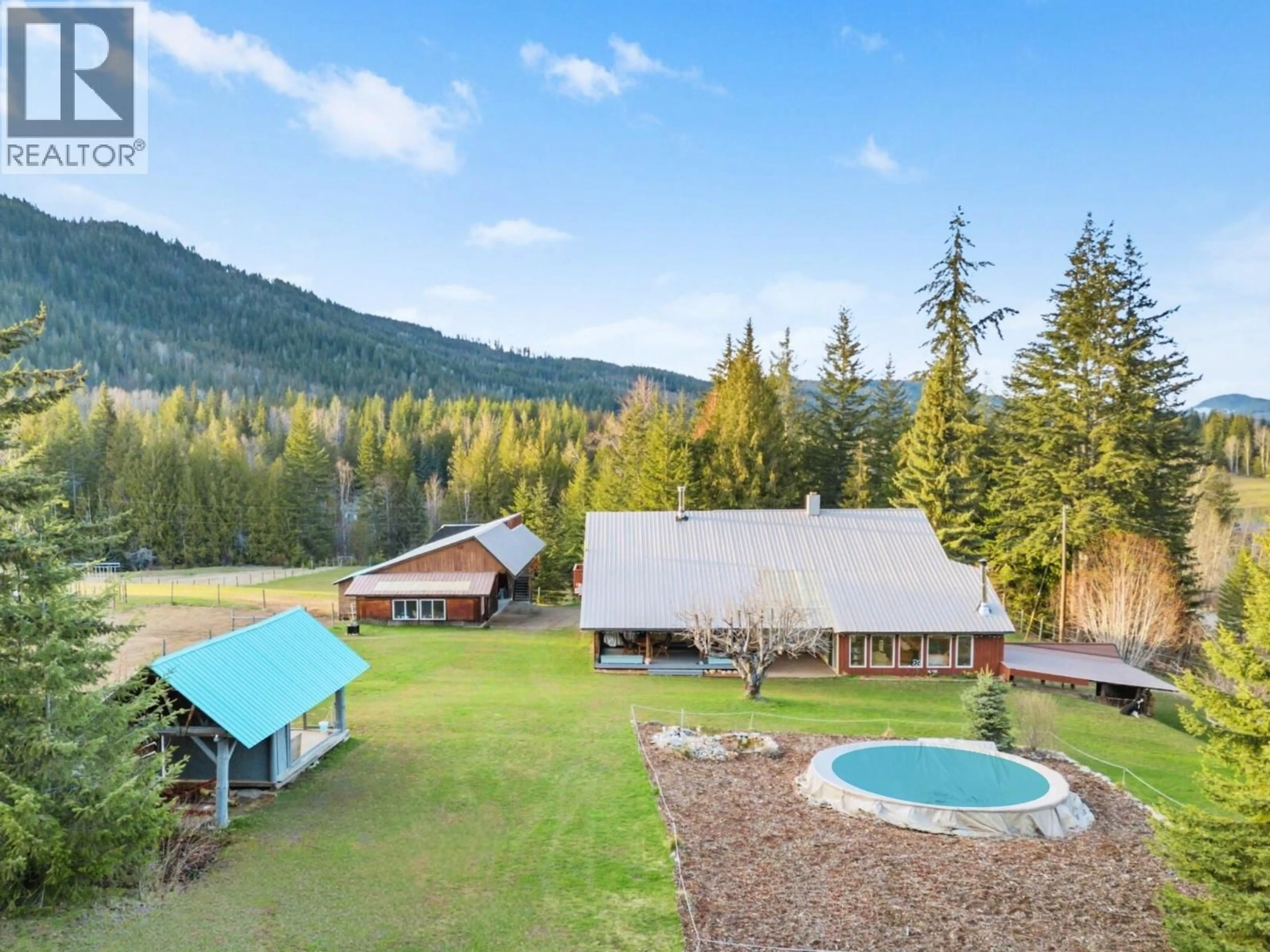 A pic from outside/outdoor area/front of a property/back of a property/a pic from drone, mountain view for 198 EDGAR ROAD, Salmon Arm British Columbia V1E2Y2