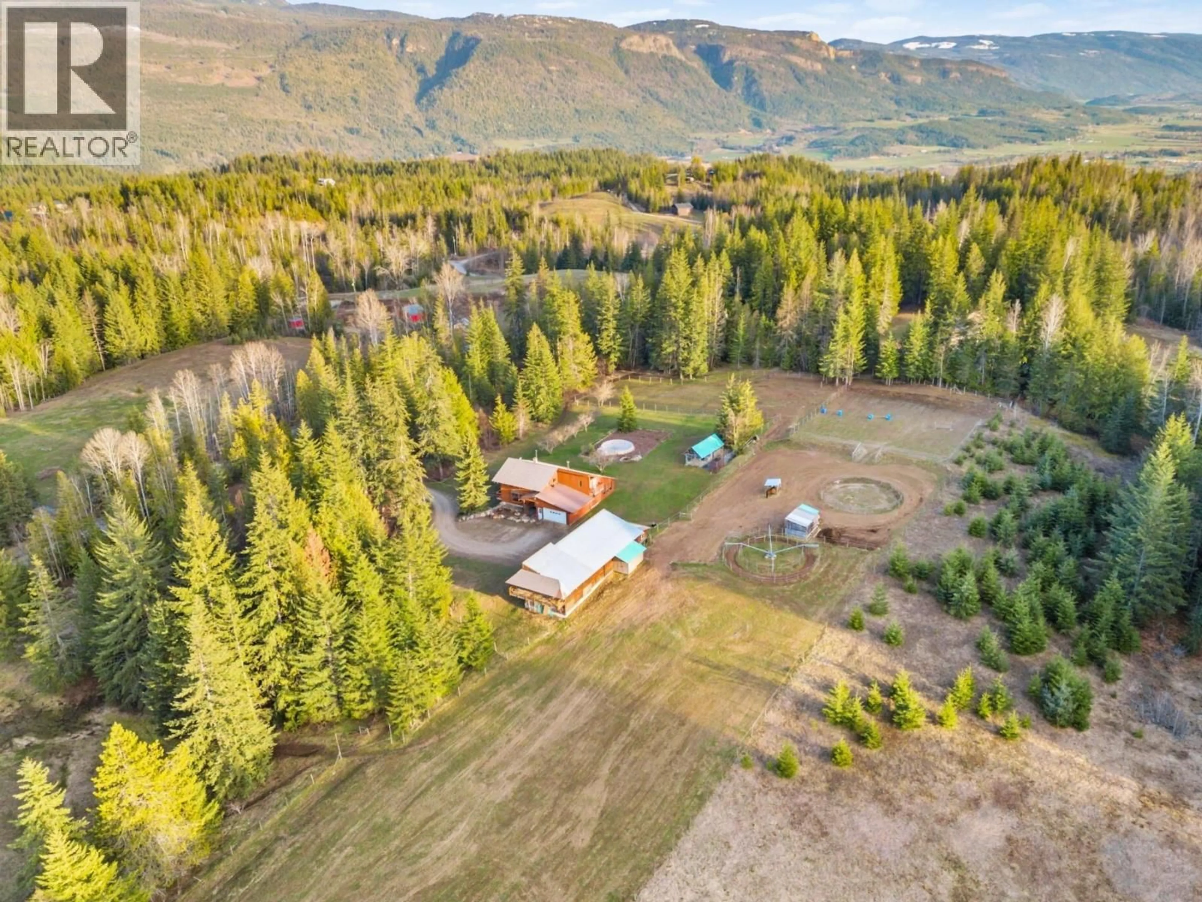 A pic from outside/outdoor area/front of a property/back of a property/a pic from drone, mountain view for 198 EDGAR ROAD, Salmon Arm British Columbia V1E2Y2