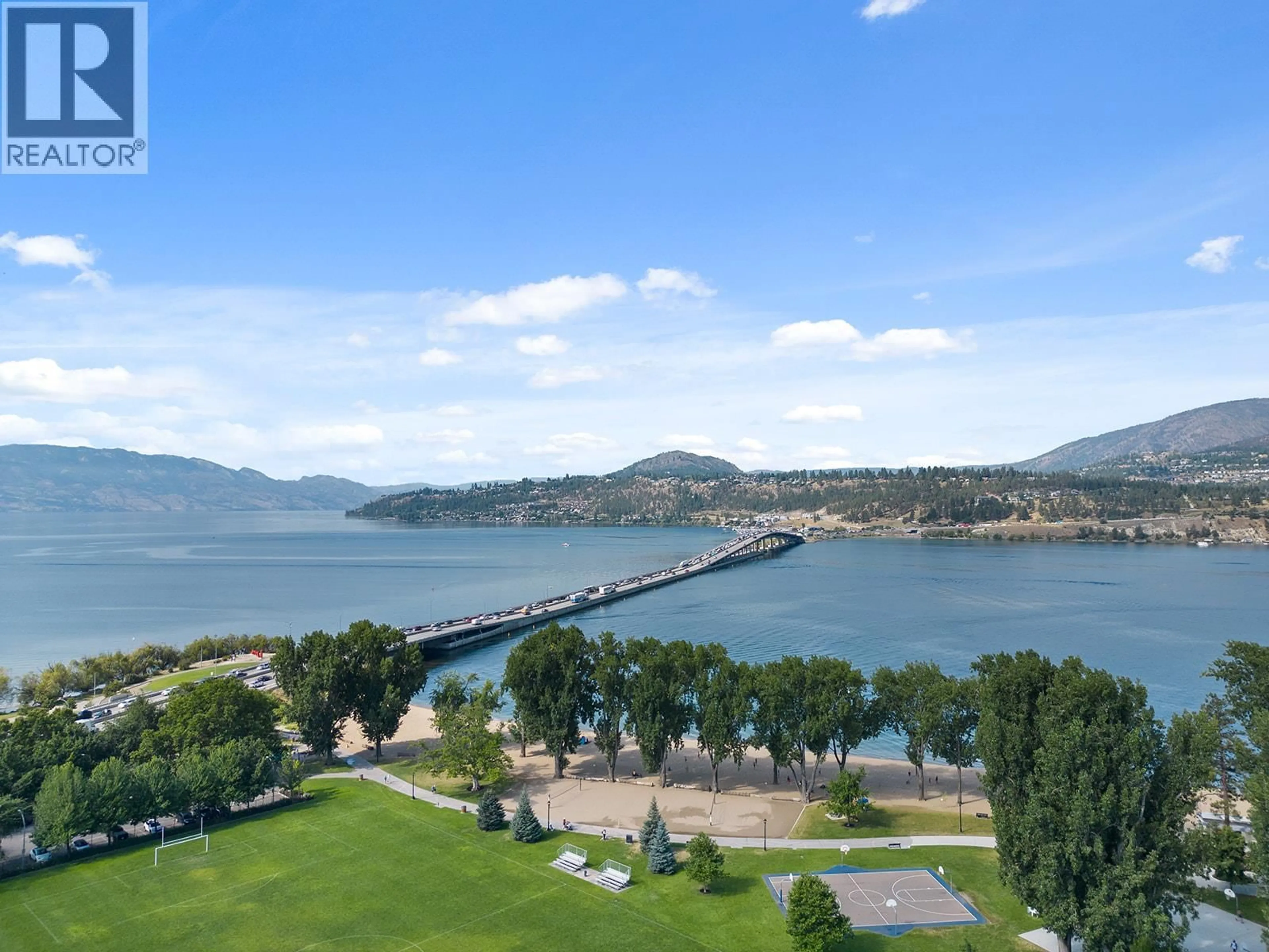 A pic from outside/outdoor area/front of a property/back of a property/a pic from drone, water/lake/river/ocean view for 1407 - 238 LEON AVENUE, Kelowna British Columbia V1Y0N6