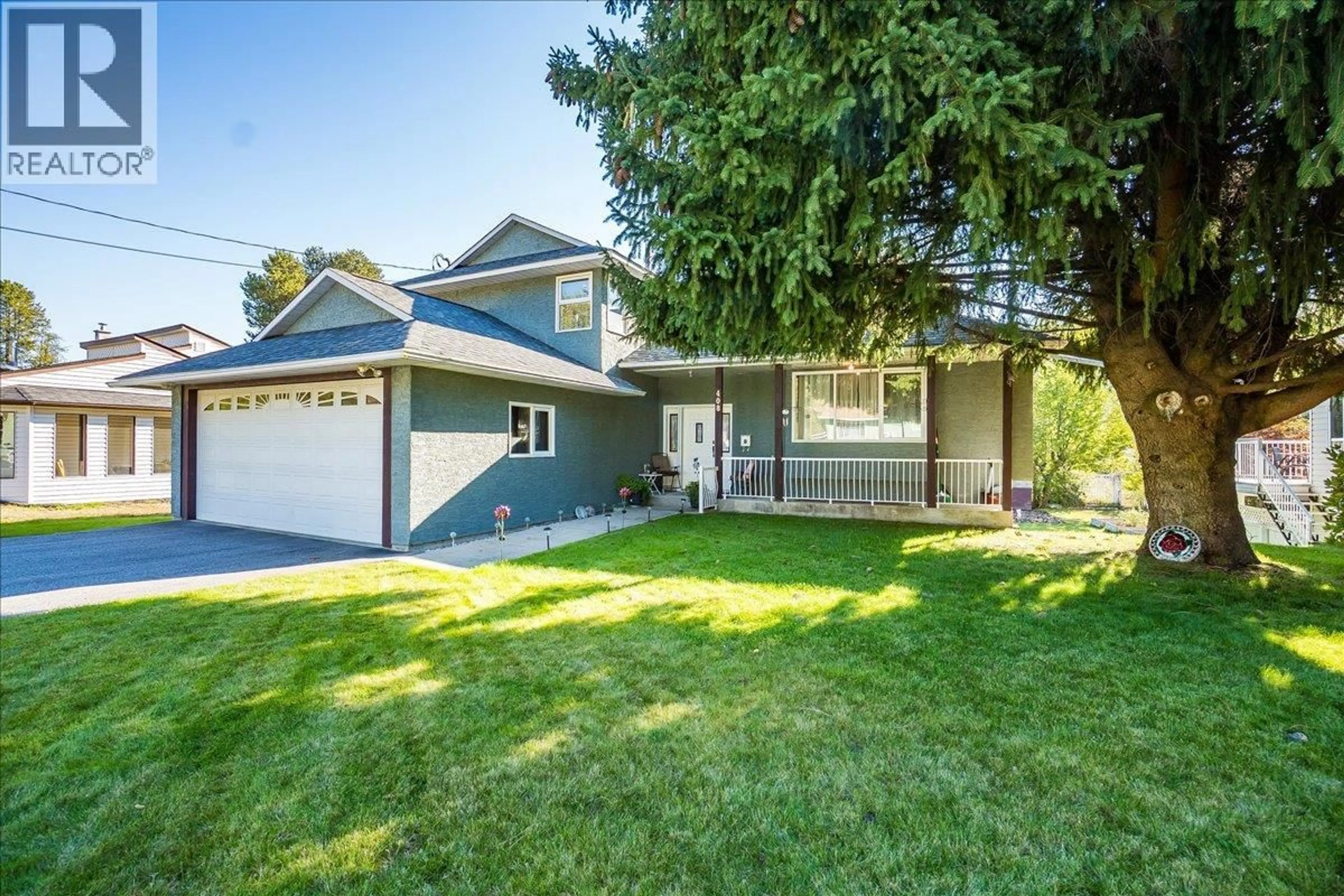 Home with vinyl exterior material, street for 408 BERESFORD CRESCENT, Castlegar British Columbia V1N3V5