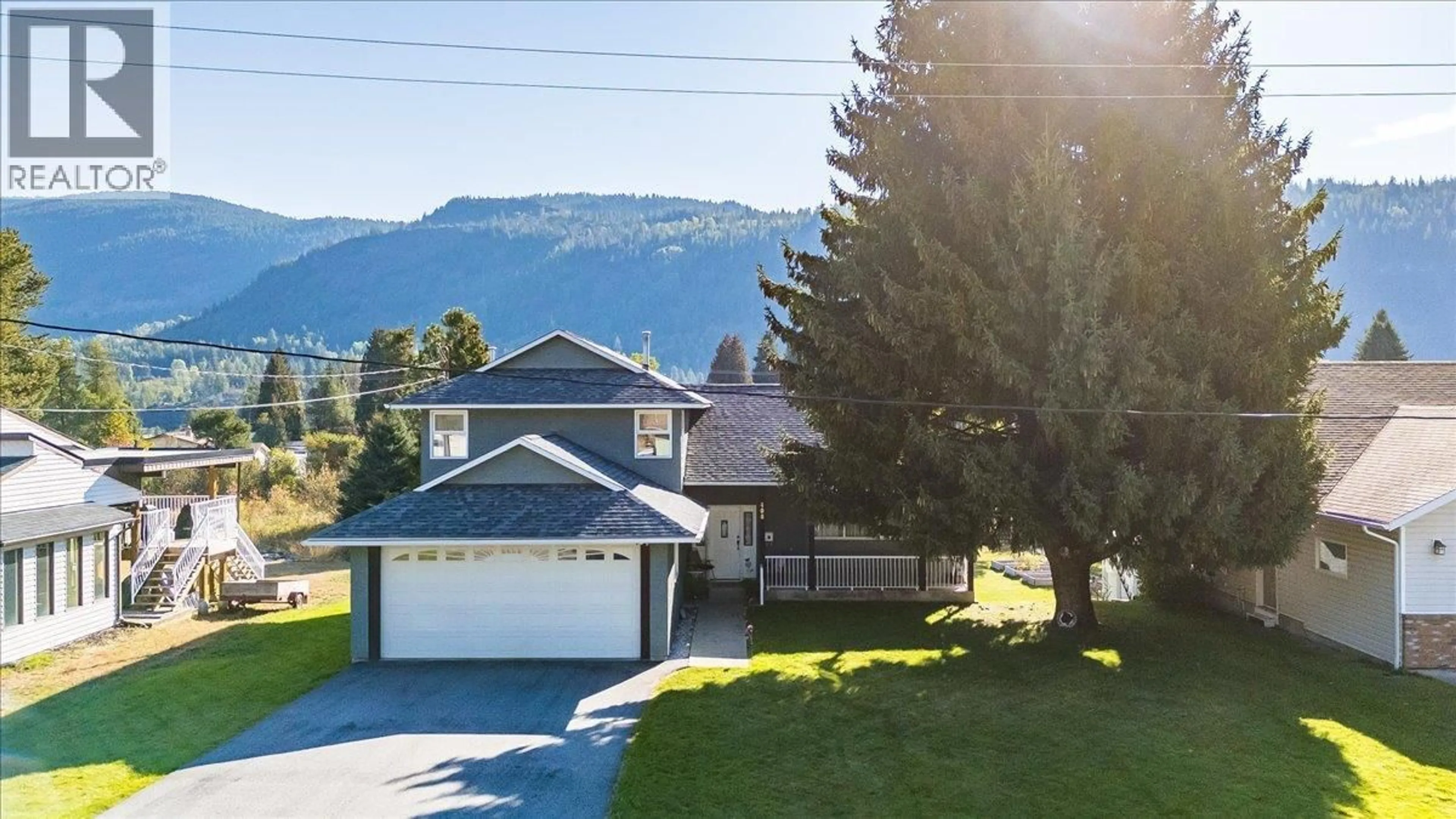 A pic from outside/outdoor area/front of a property/back of a property/a pic from drone, mountain view for 408 BERESFORD CRESCENT, Castlegar British Columbia V1N3V5