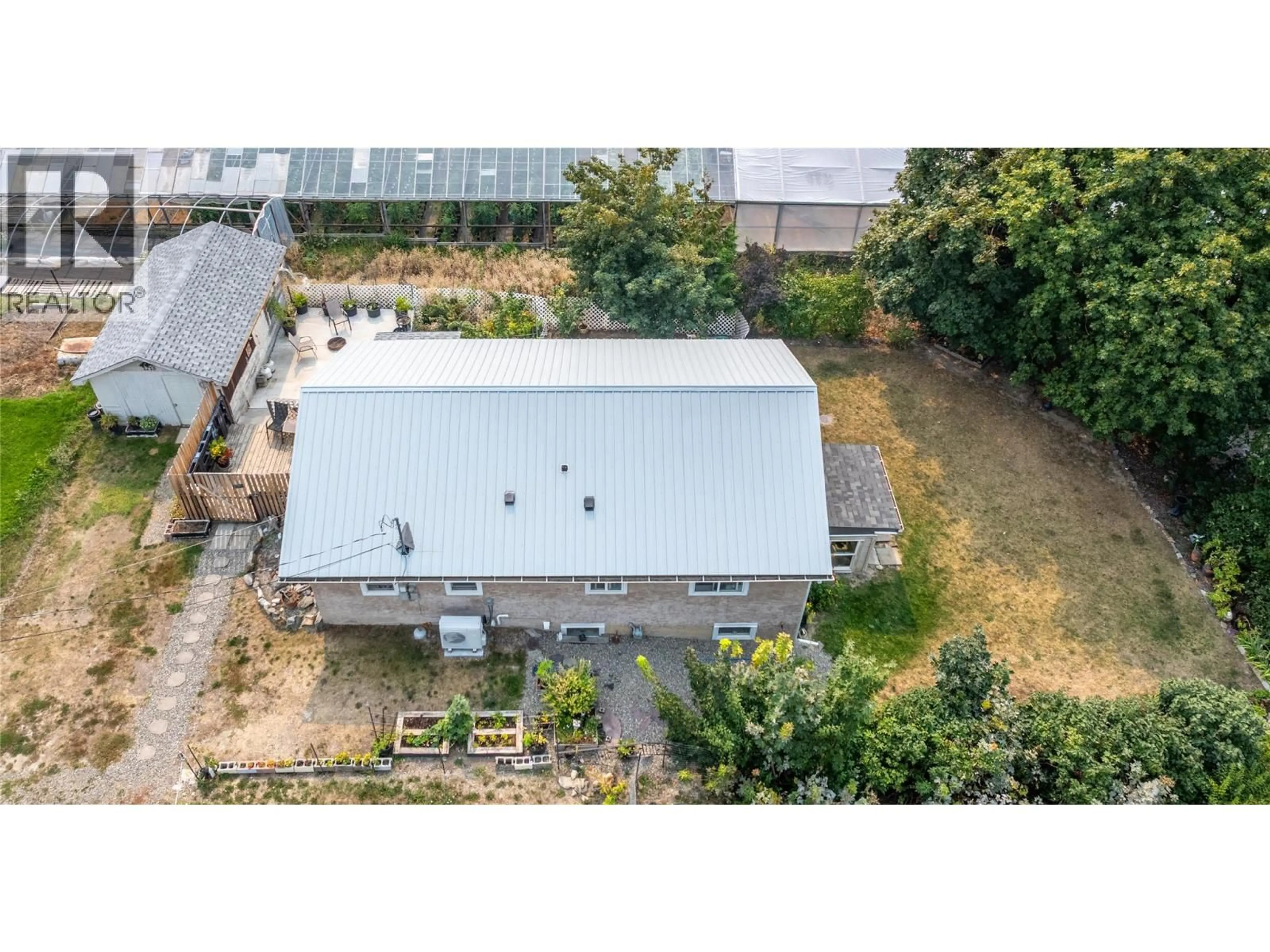 A pic from outside/outdoor area/front of a property/back of a property/a pic from drone, building for 1215 ERICKSON ROAD, Creston British Columbia V0B1G3