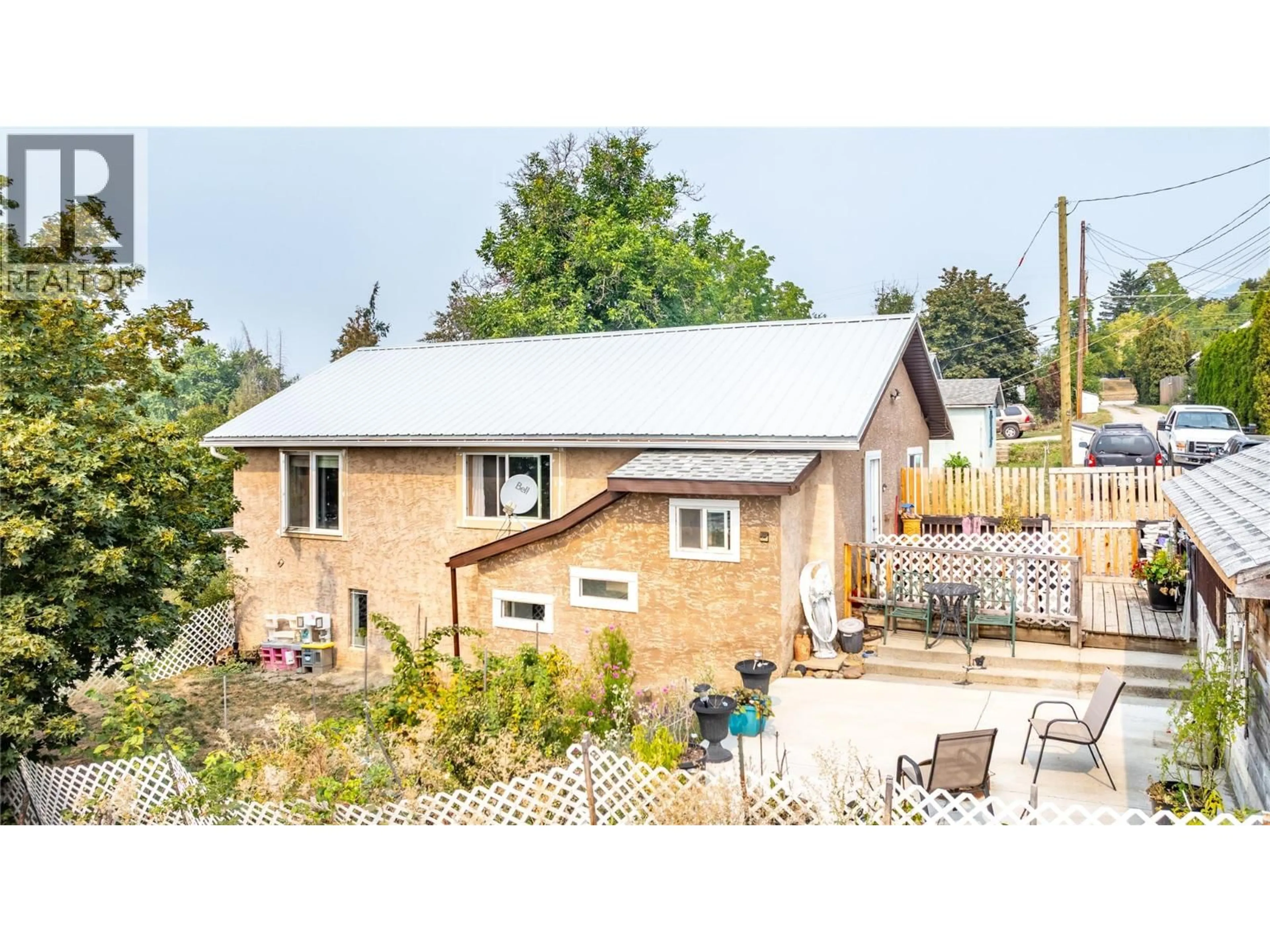 A pic from outside/outdoor area/front of a property/back of a property/a pic from drone, street for 1215 ERICKSON ROAD, Creston British Columbia V0B1G3