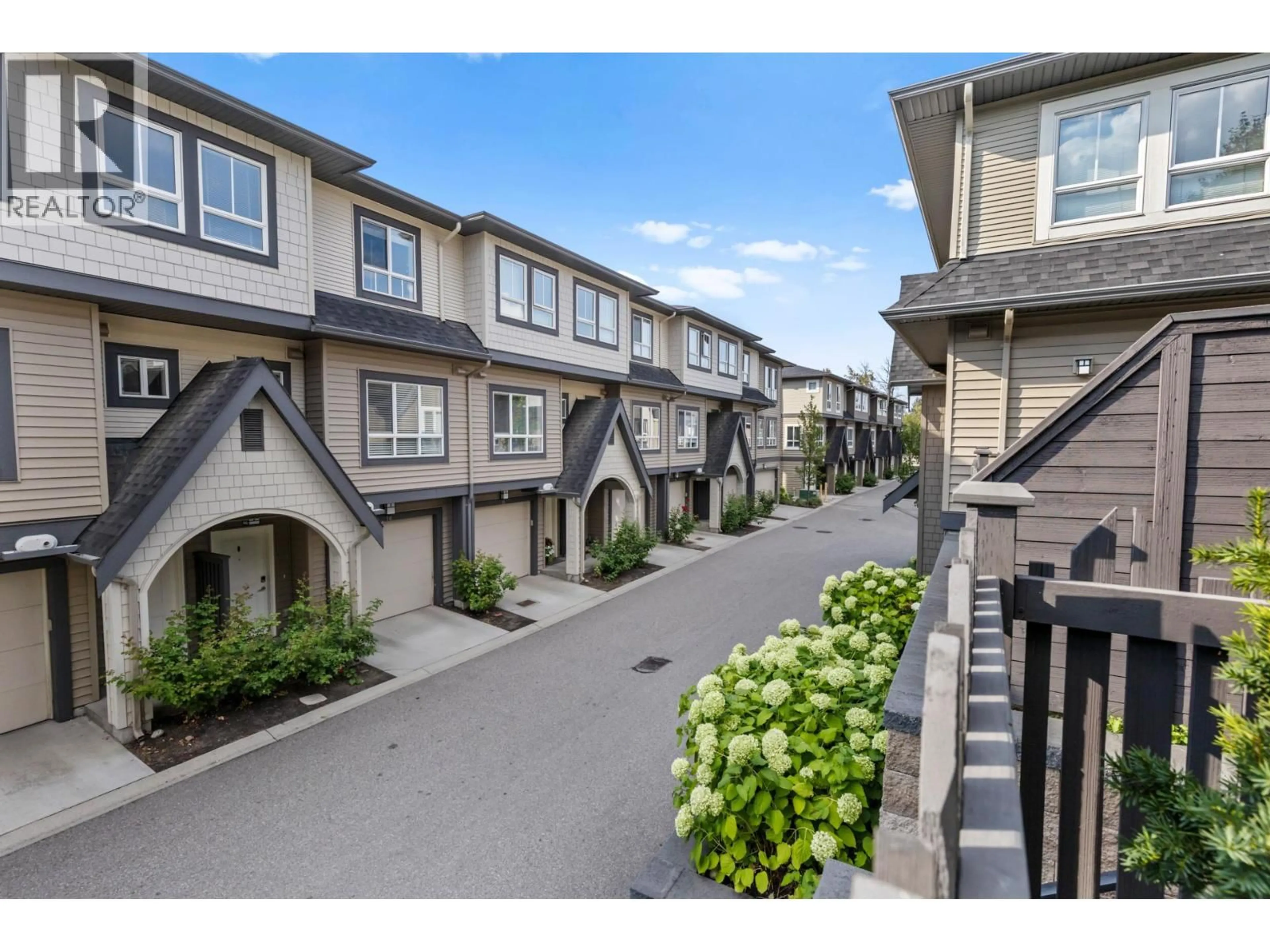 A pic from outside/outdoor area/front of a property/back of a property/a pic from drone, street for 1 - 680 OLD MEADOWS ROAD, Kelowna British Columbia V1W5L4