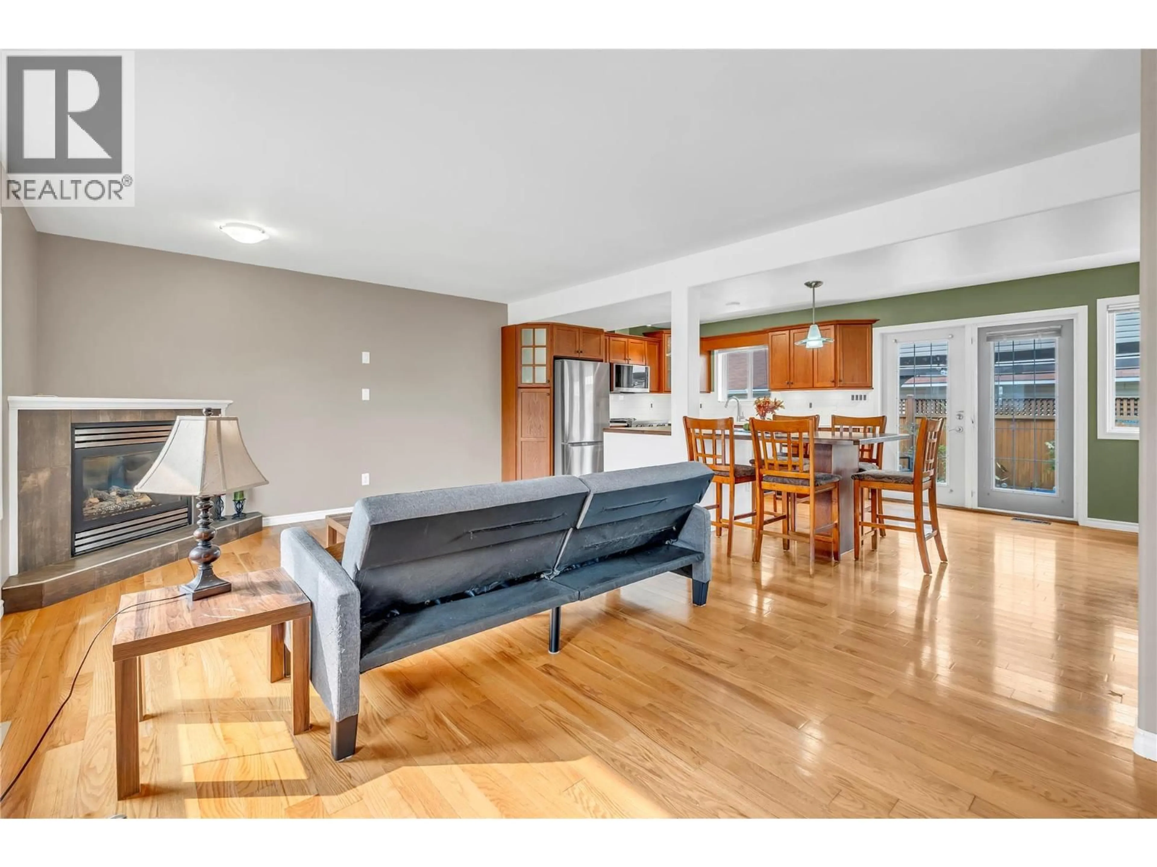 Open concept kitchen, wood/laminate floor for 103 - 102 REGINA AVENUE, Penticton British Columbia V2A2K8