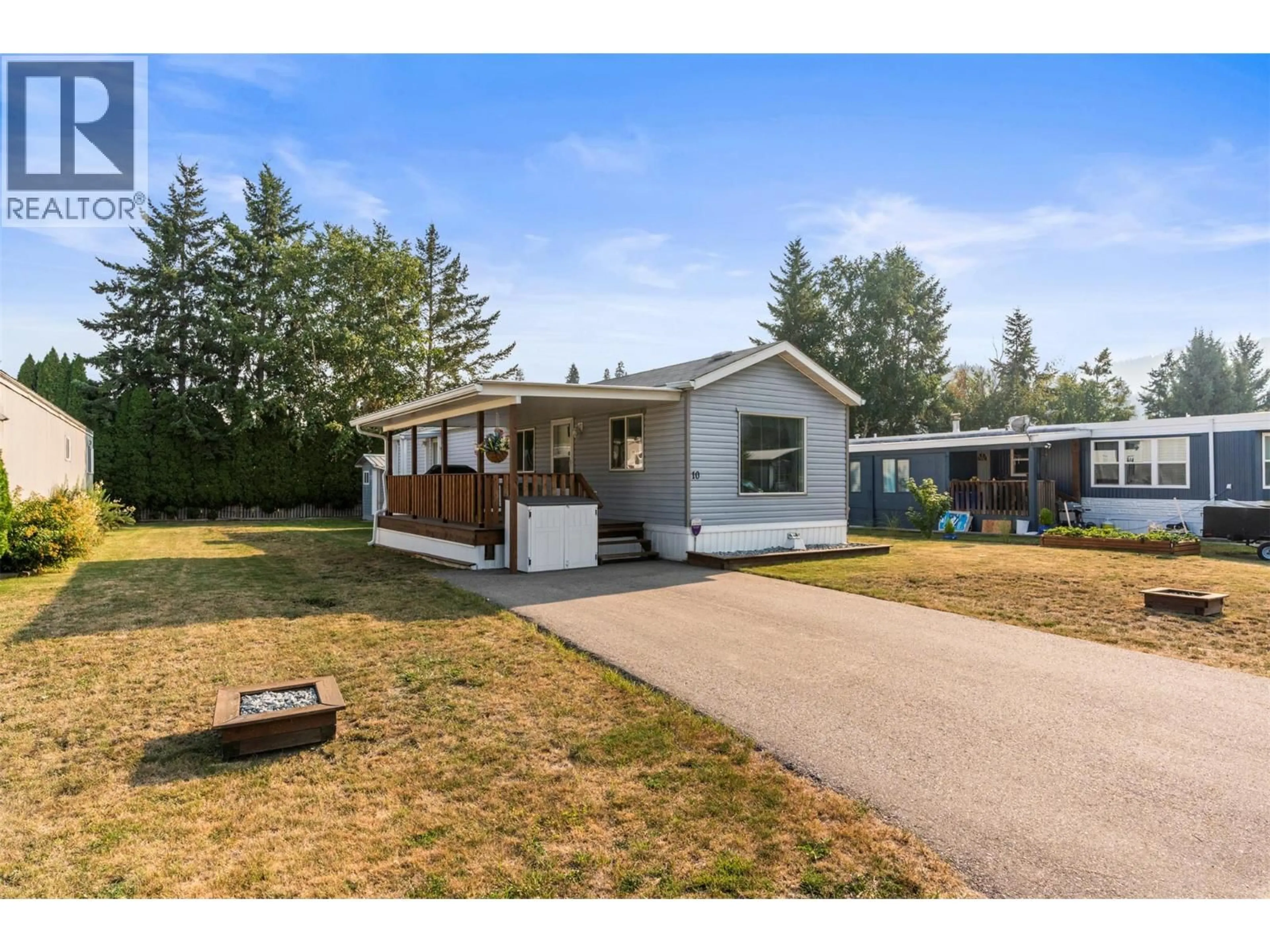 Home with vinyl exterior material, street for 10 - 136 MEADOW CRESCENT, Enderby British Columbia V0E1V0