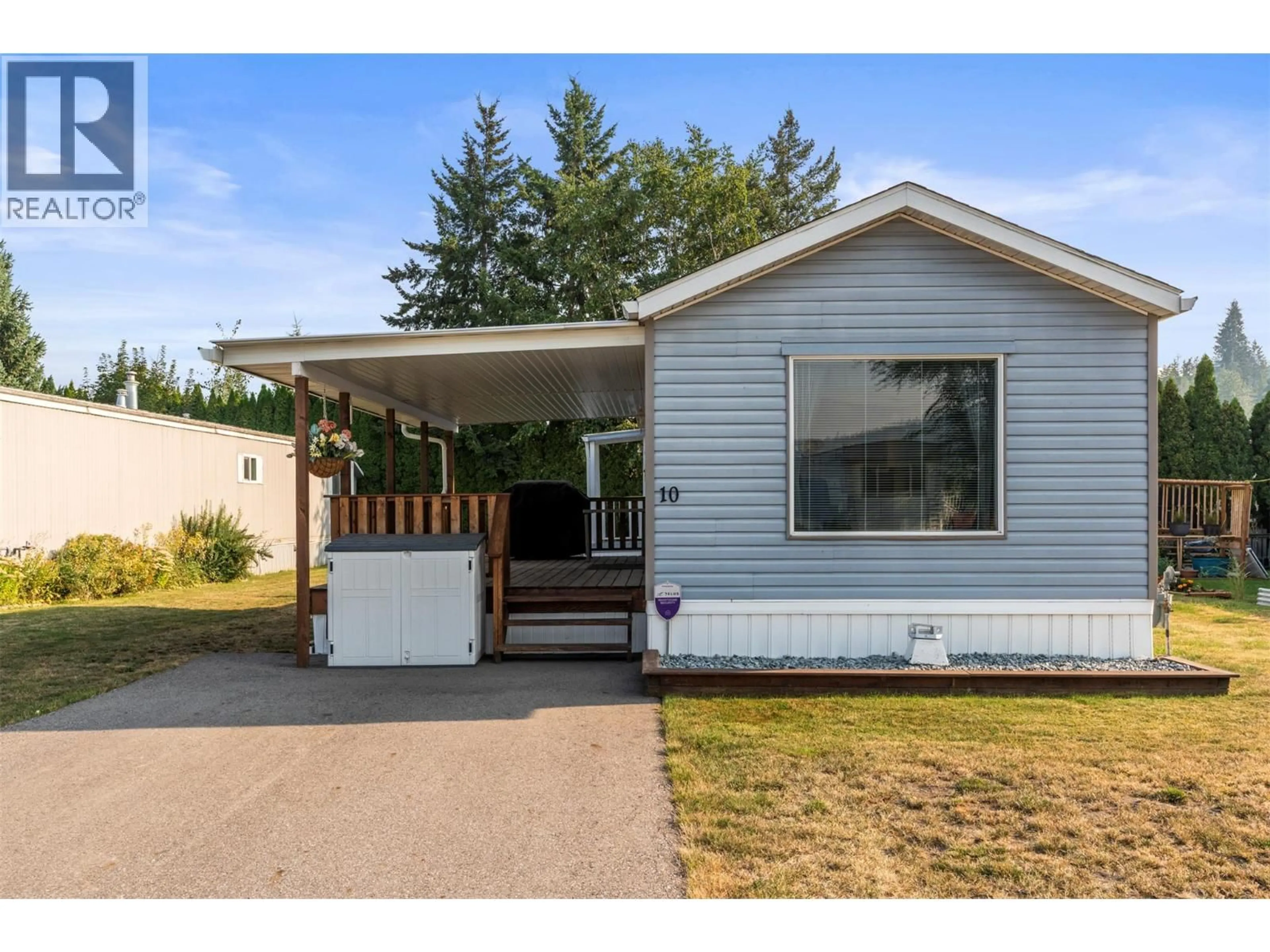Home with vinyl exterior material, street for 10 - 136 MEADOW CRESCENT, Enderby British Columbia V0E1V0
