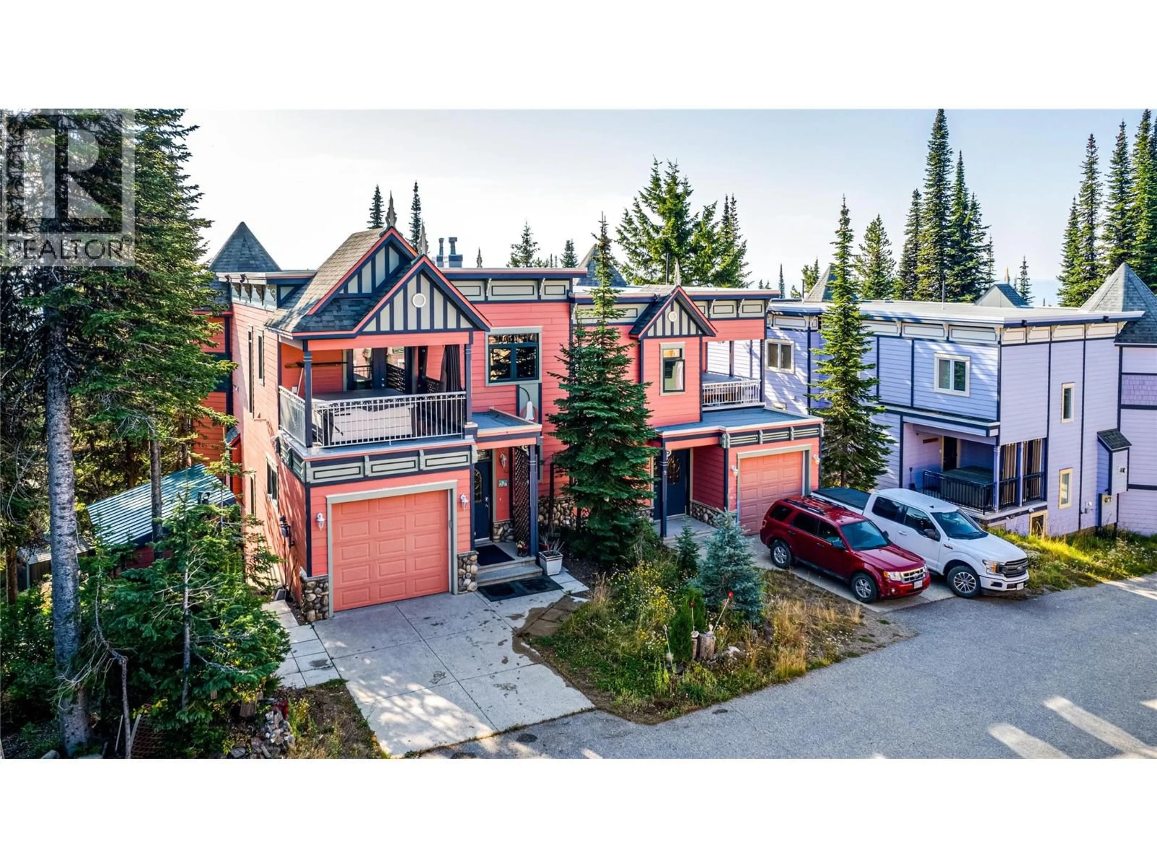A pic from outside/outdoor area/front of a property/back of a property/a pic from drone, street for 8 - 635 MONASHEE ROAD, Silver Star British Columbia V1B0T1
