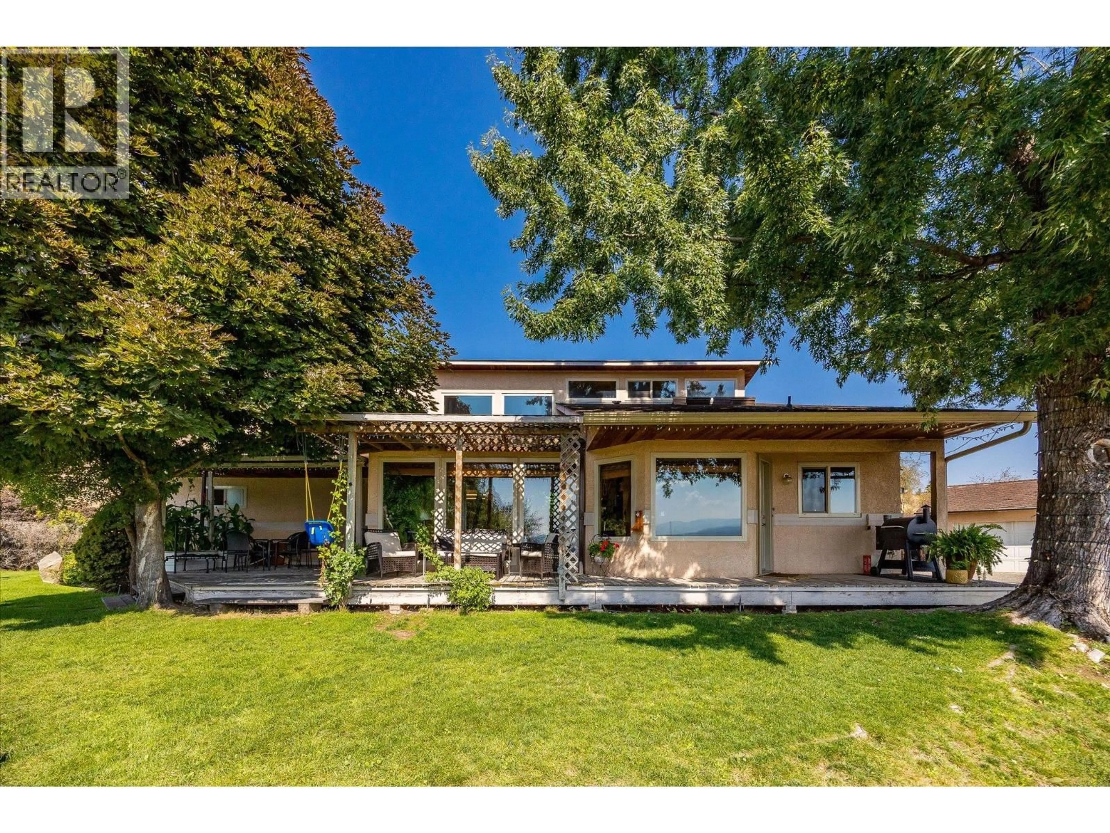 A pic from outside/outdoor area/front of a property/back of a property/a pic from drone, water/lake/river/ocean view for 12349 LAKE HILL DRIVE, Lake Country British Columbia V4V1G2
