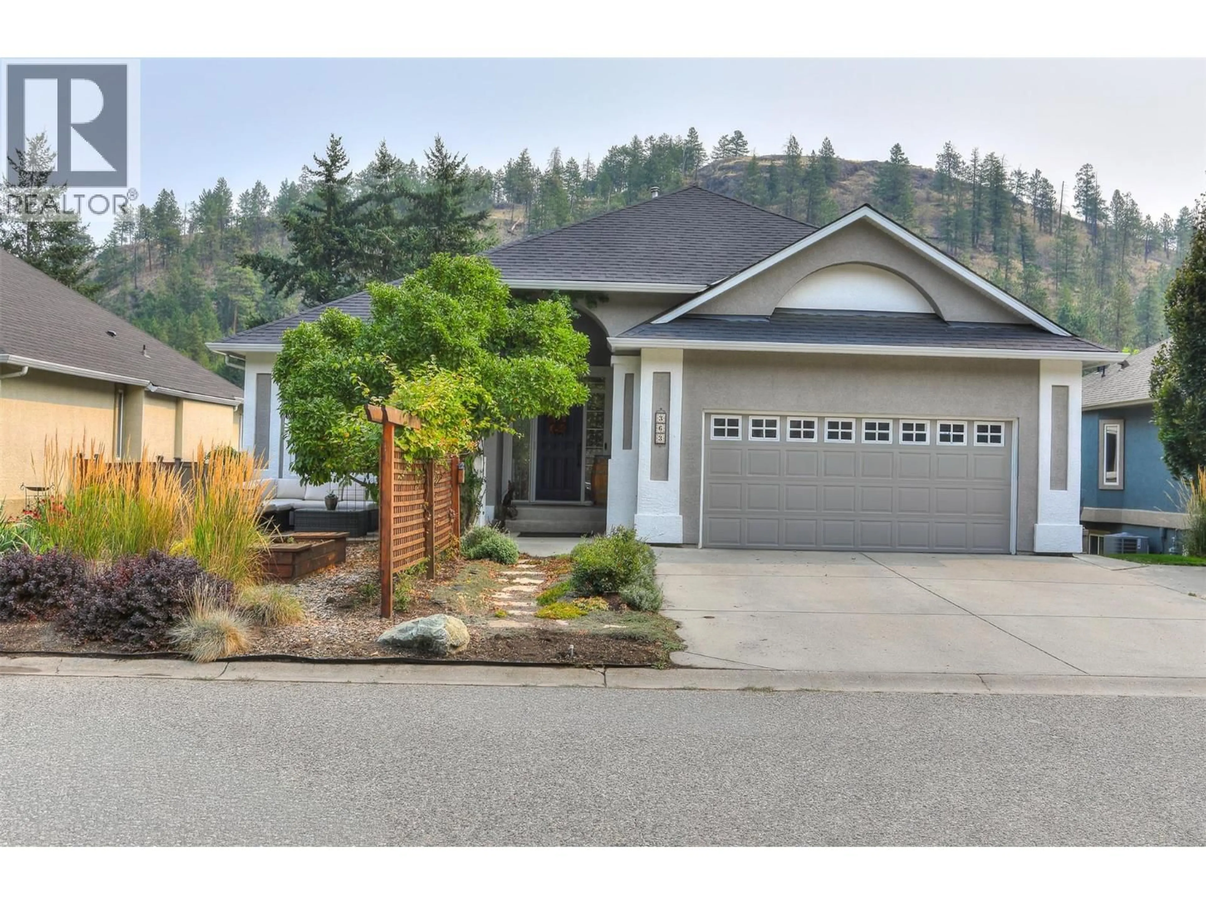 Home with vinyl exterior material, street for 363 WOODPARK CRESCENT, Kelowna British Columbia V1V2L1