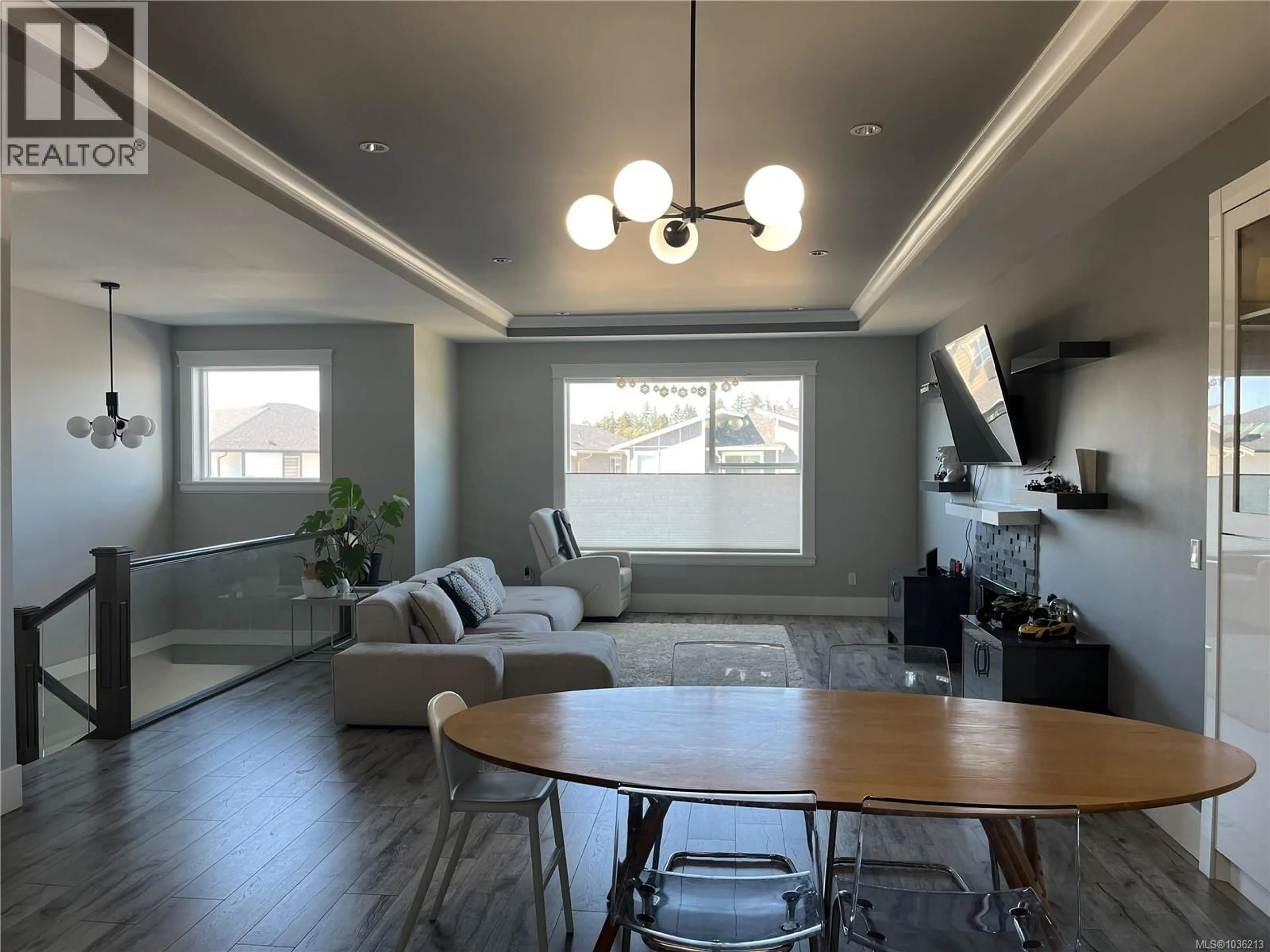 Living room with furniture, wood/laminate floor for 135 LINDQUIST ROAD, Nanaimo British Columbia V9T0J9