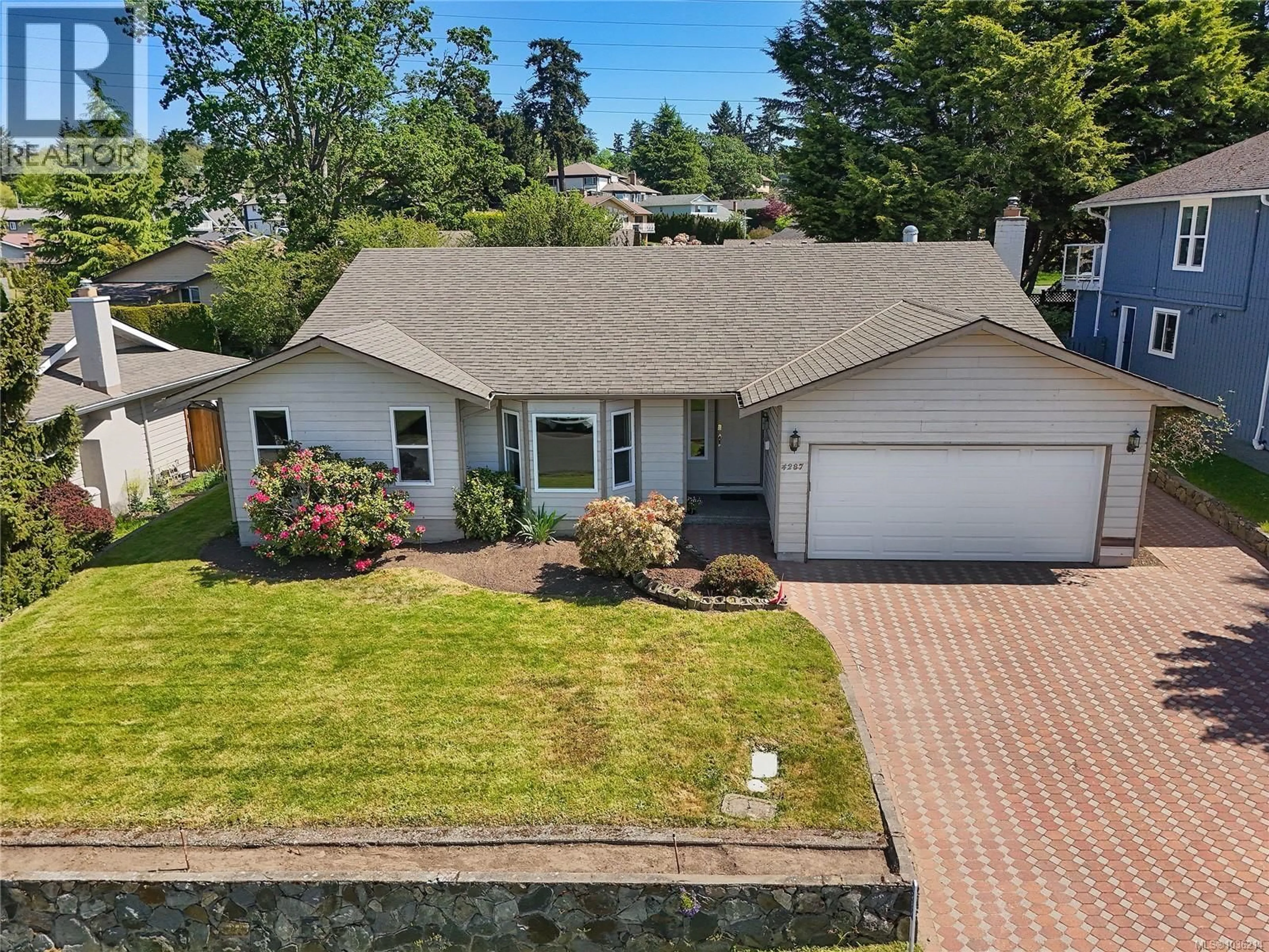 A pic from outside/outdoor area/front of a property/back of a property/a pic from drone, street for 4287 PANORAMA PLACE, Saanich British Columbia V8X4X7