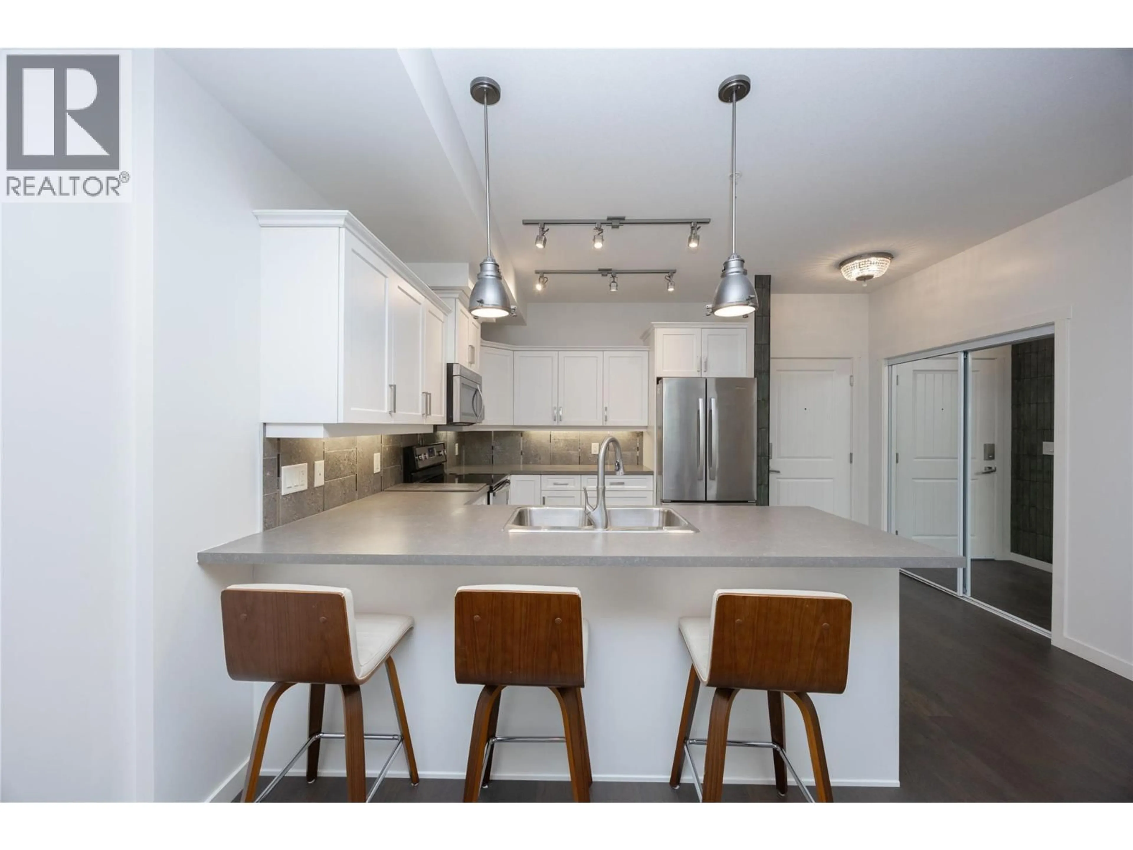 Open concept kitchen, unknown for 103 - 3733 CASORSO ROAD, Kelowna British Columbia V1W5E3