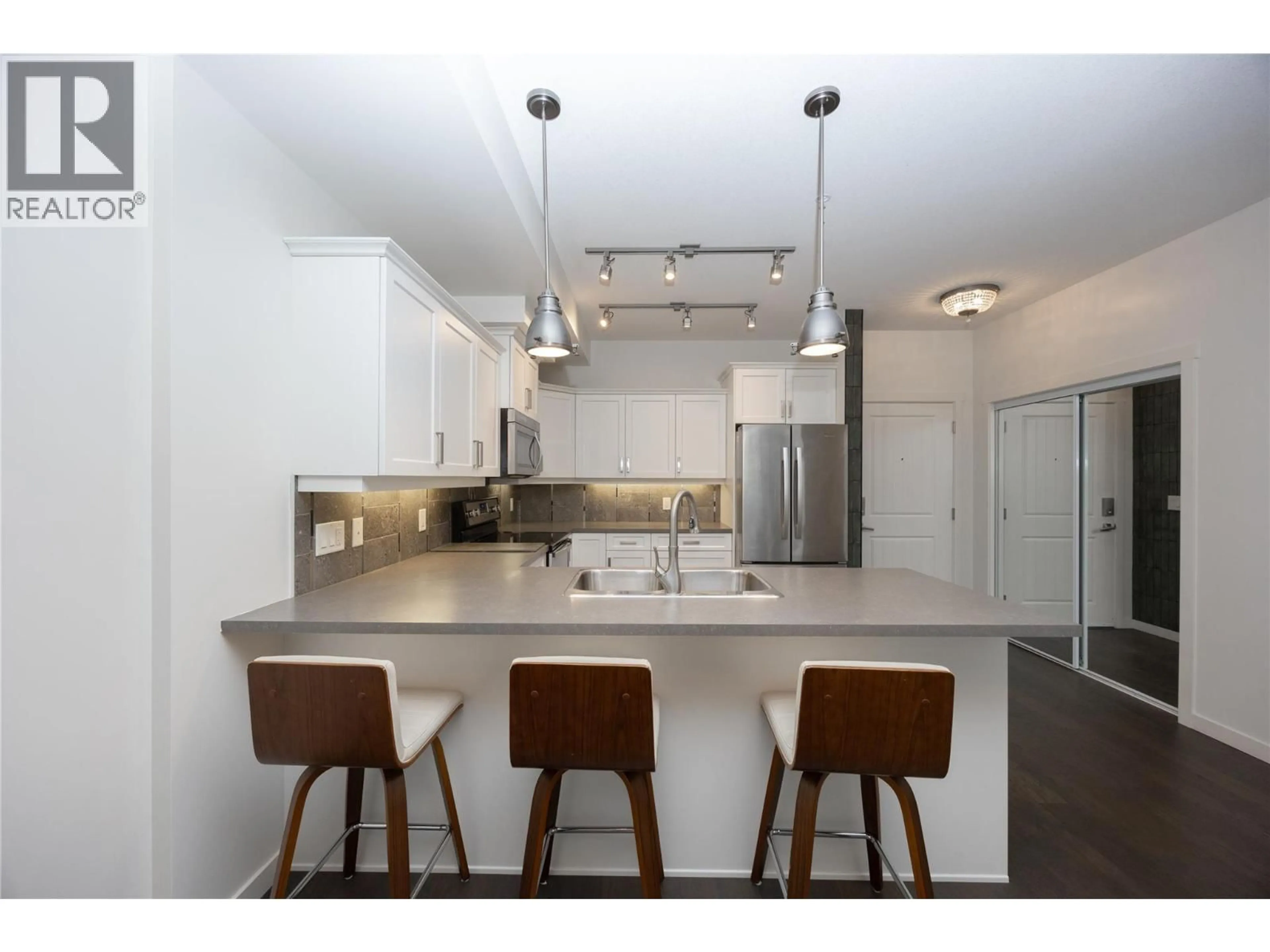 Open concept kitchen, unknown for 103 - 3733 CASORSO ROAD, Kelowna British Columbia V1W5E3