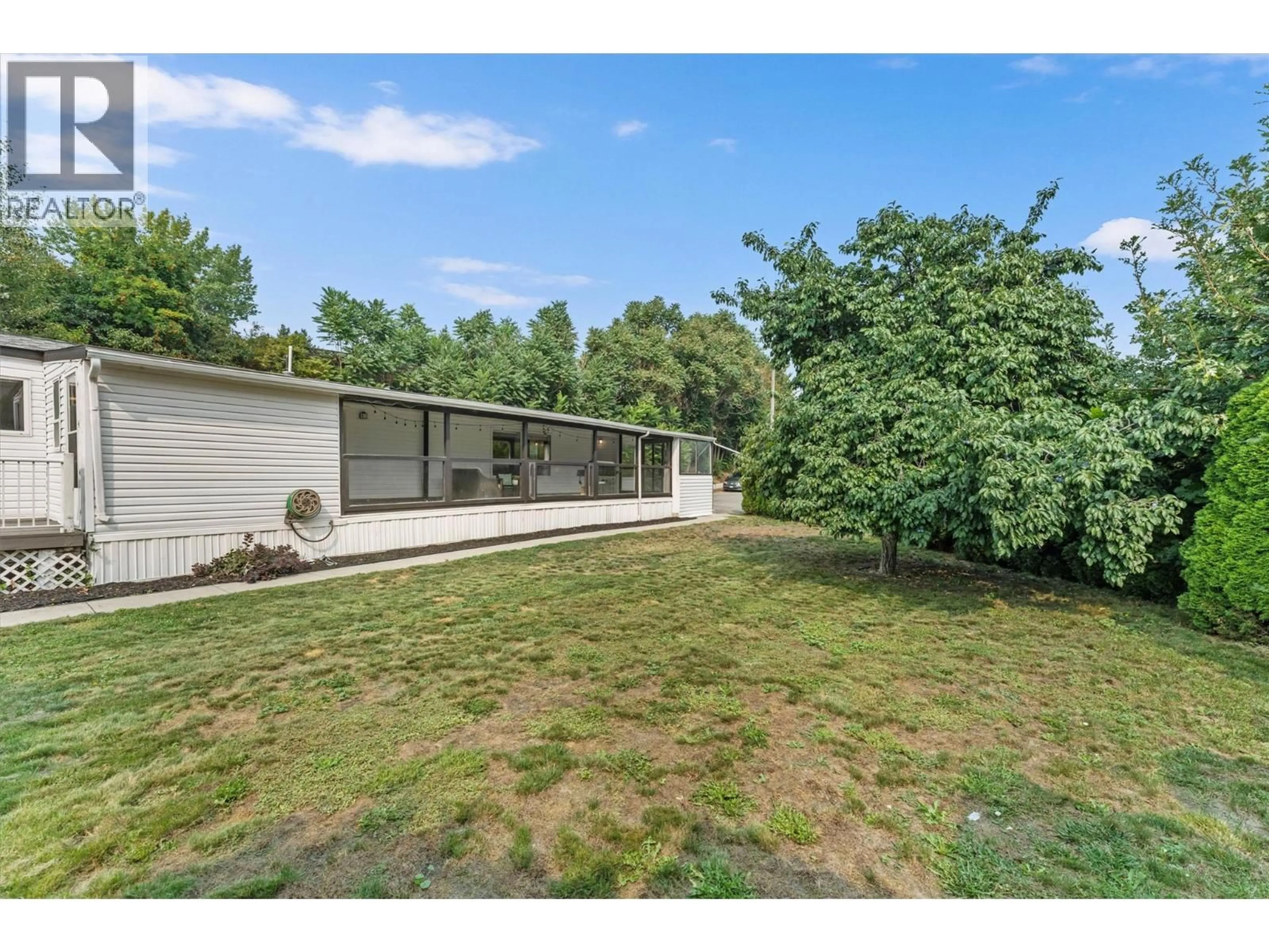 A pic from outside/outdoor area/front of a property/back of a property/a pic from drone, unknown for 101 - 1699 ROSS ROAD, West Kelowna British Columbia V1Z1L8