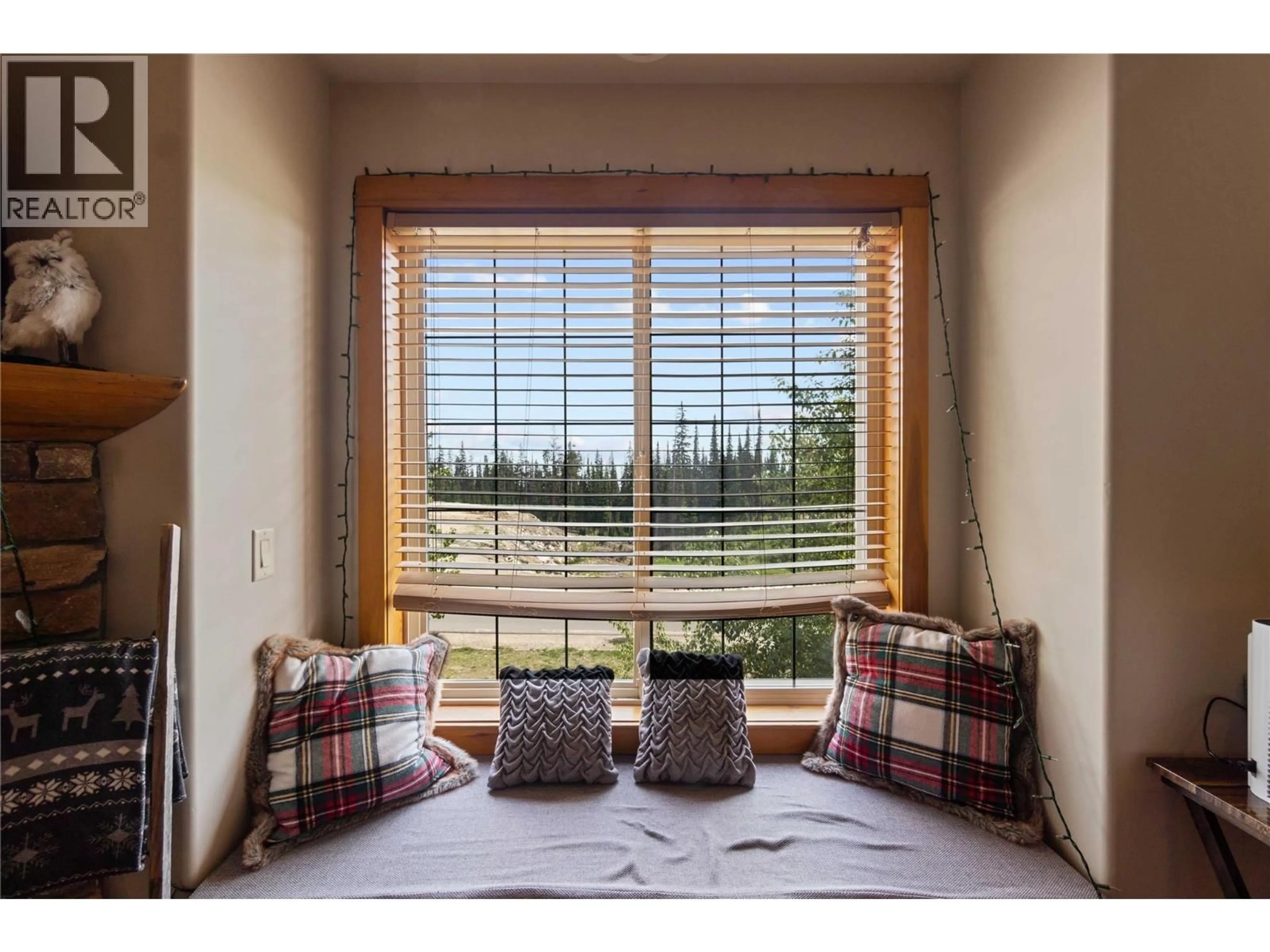 Bedroom with bed, wood/laminate floor for 2 - 5015 SNOWBIRD WAY, Big White British Columbia V1P1P3