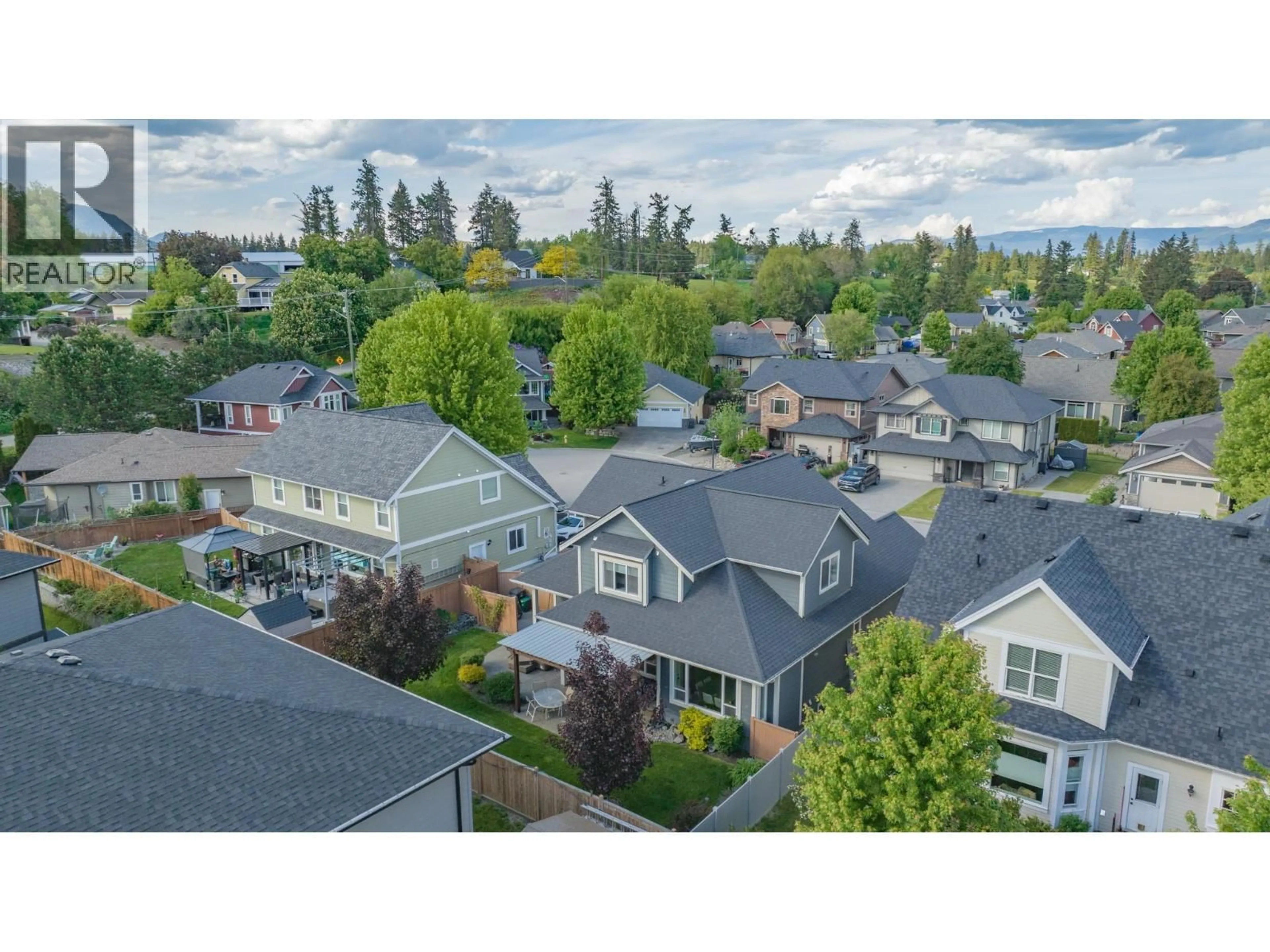 A pic from outside/outdoor area/front of a property/back of a property/a pic from drone, mountain view for 3905 RANKINE PLACE, Armstrong British Columbia V4Y0X9