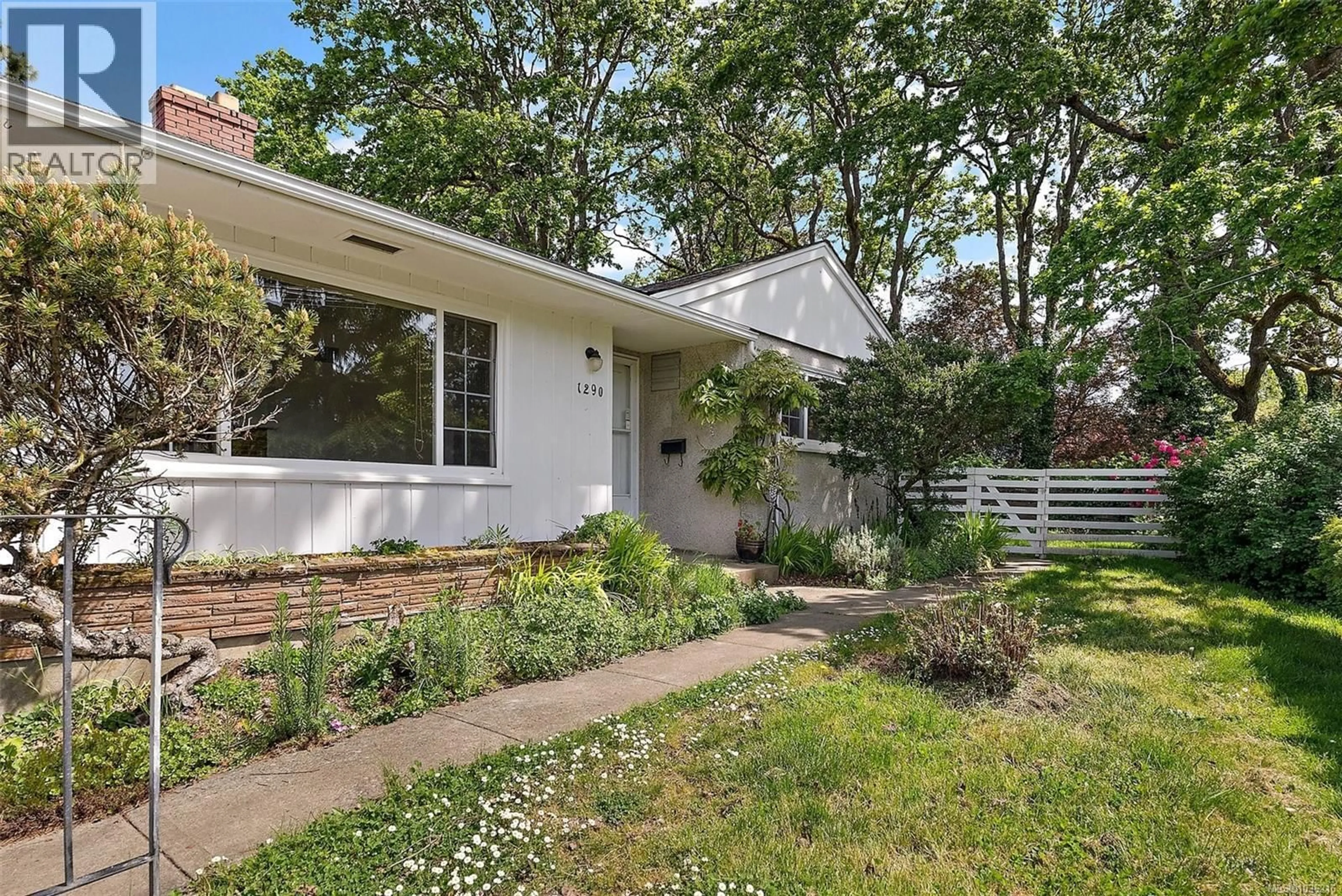 Home with vinyl exterior material, street for 1290 DERBY ROAD, Saanich British Columbia V8P1S8