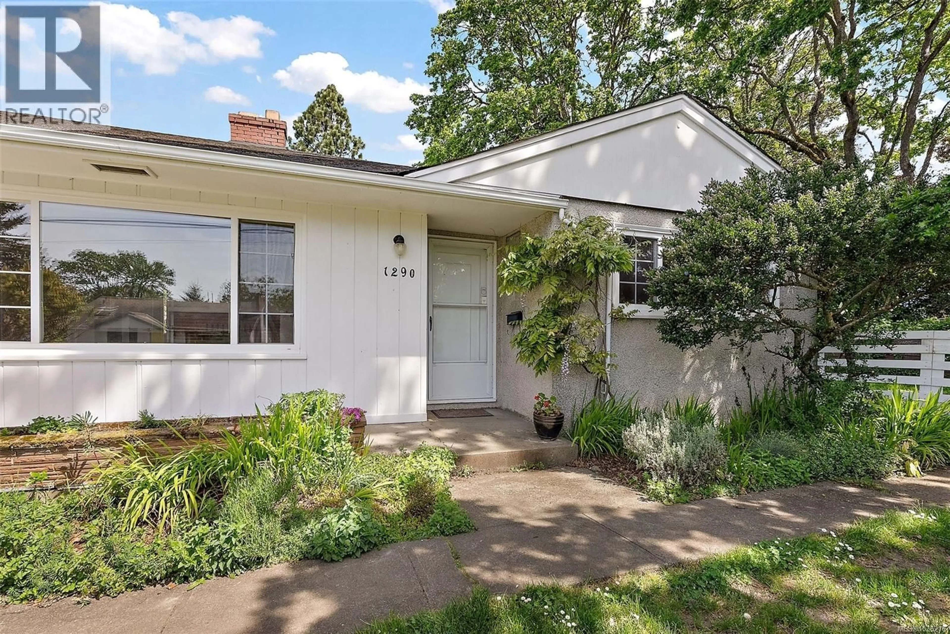 Home with vinyl exterior material, street for 1290 DERBY ROAD, Saanich British Columbia V8P1S8