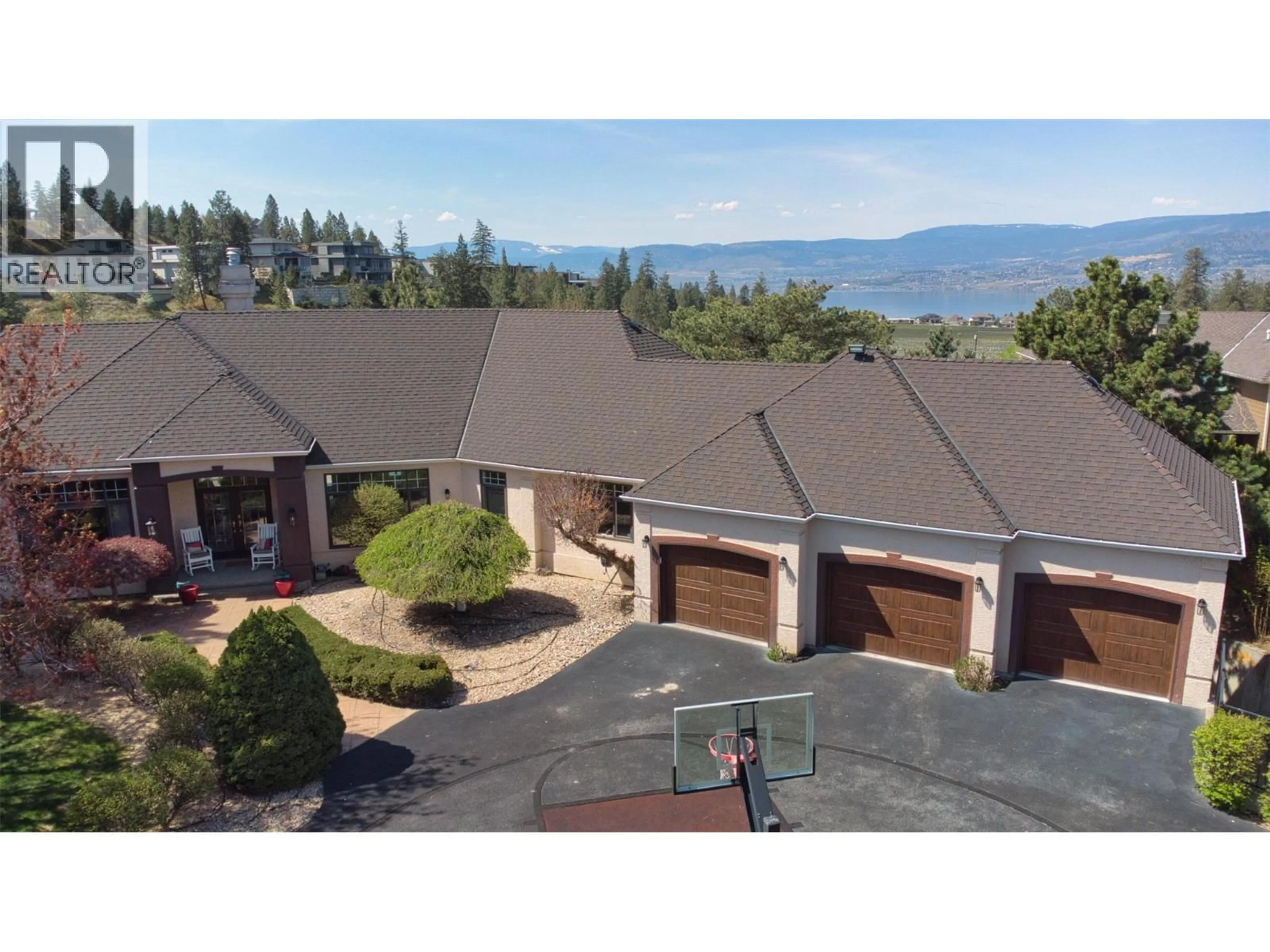 A pic from outside/outdoor area/front of a property/back of a property/a pic from drone, mountain view for 1117 CRAWFORD ROAD, Kelowna British Columbia V1Z3L7