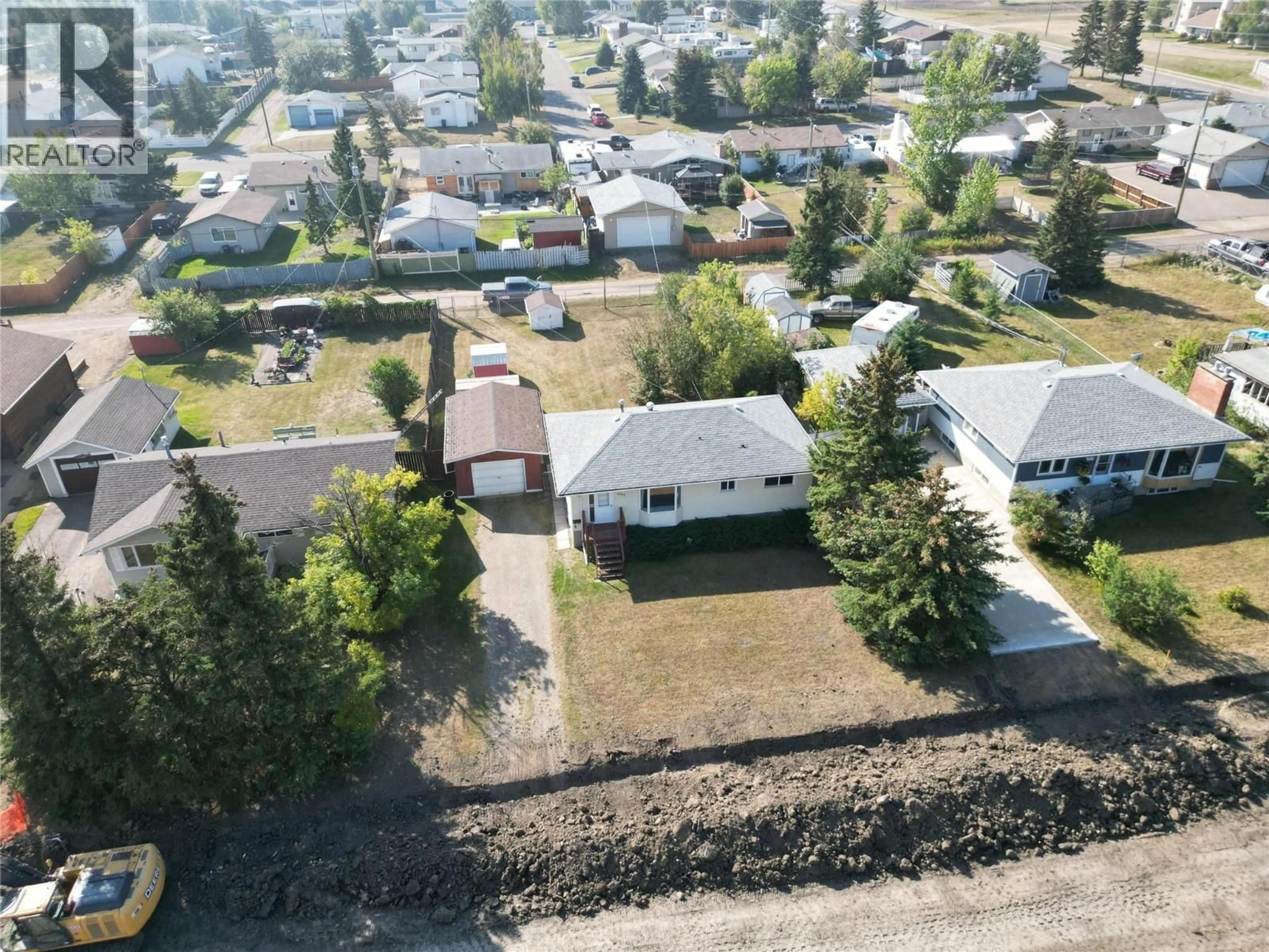 A pic from outside/outdoor area/front of a property/back of a property/a pic from drone, unknown for 1549 110 AVENUE, Dawson Creek British Columbia V1G2W3