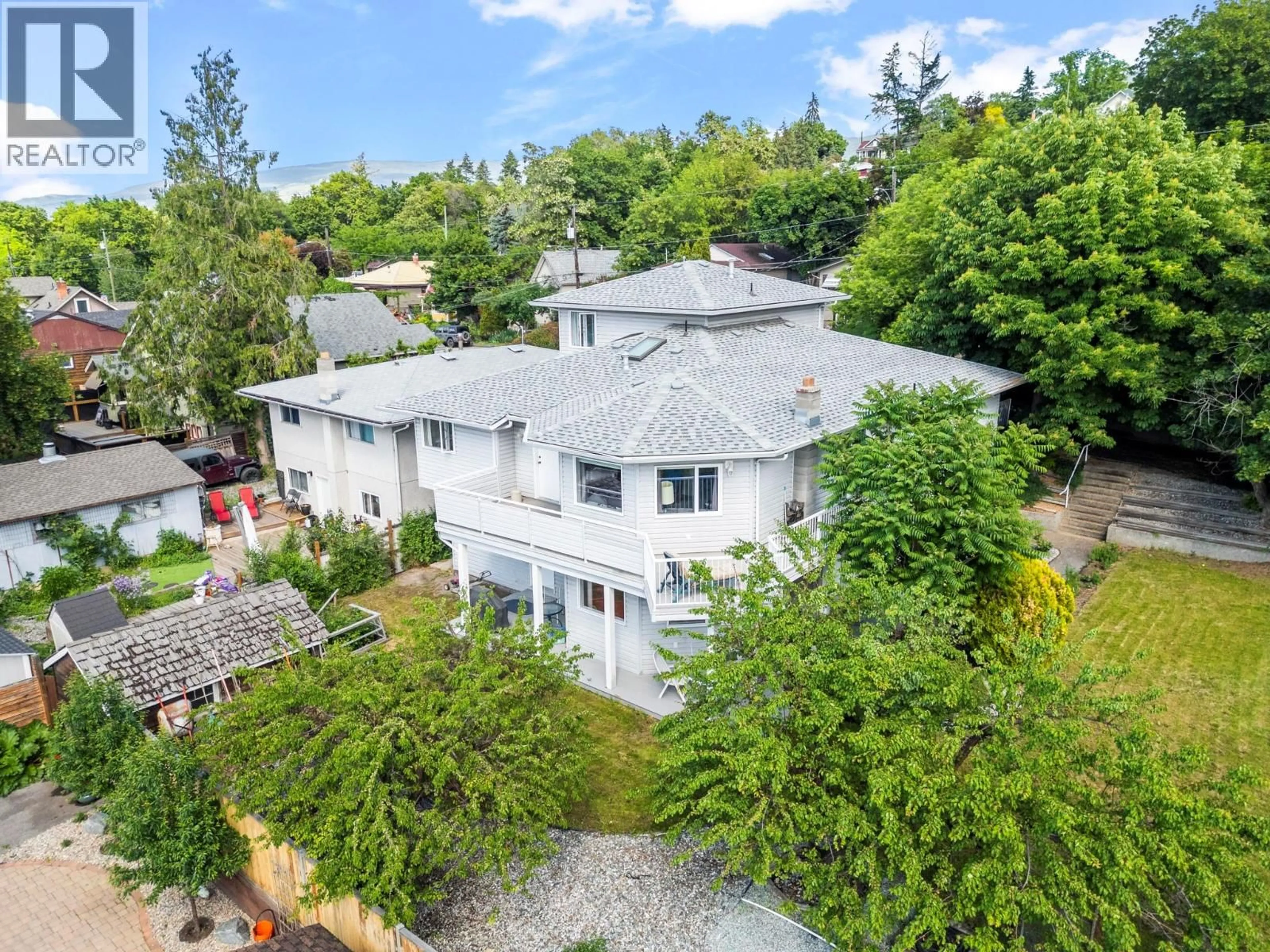 A pic from outside/outdoor area/front of a property/back of a property/a pic from drone, street for 2804 25 STREET, Vernon British Columbia V1T4P9